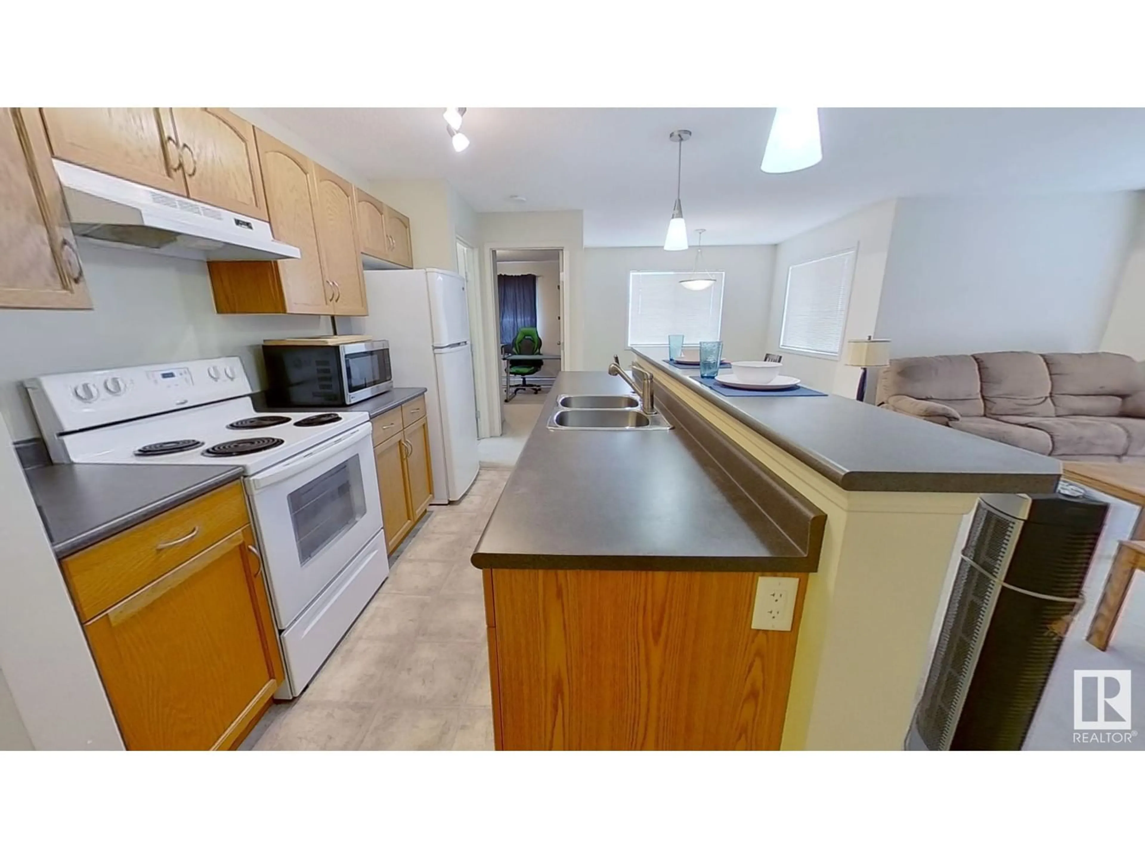 Standard kitchen, wood floors for #416 1188 HYNDMAN RD NW, Edmonton Alberta T5A0E9