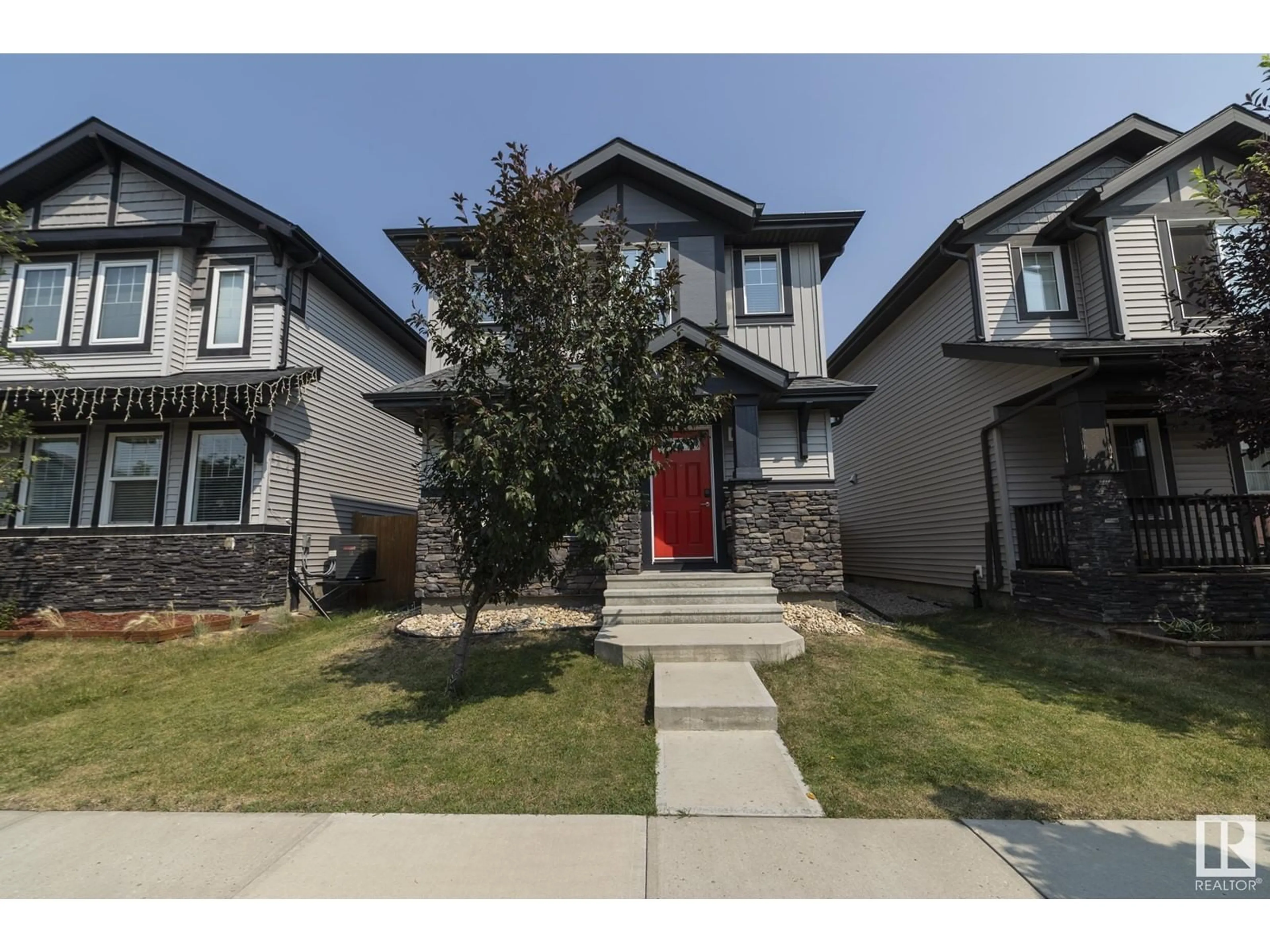 Frontside or backside of a home for 16012 13 AV SW, Edmonton Alberta T6W3N6