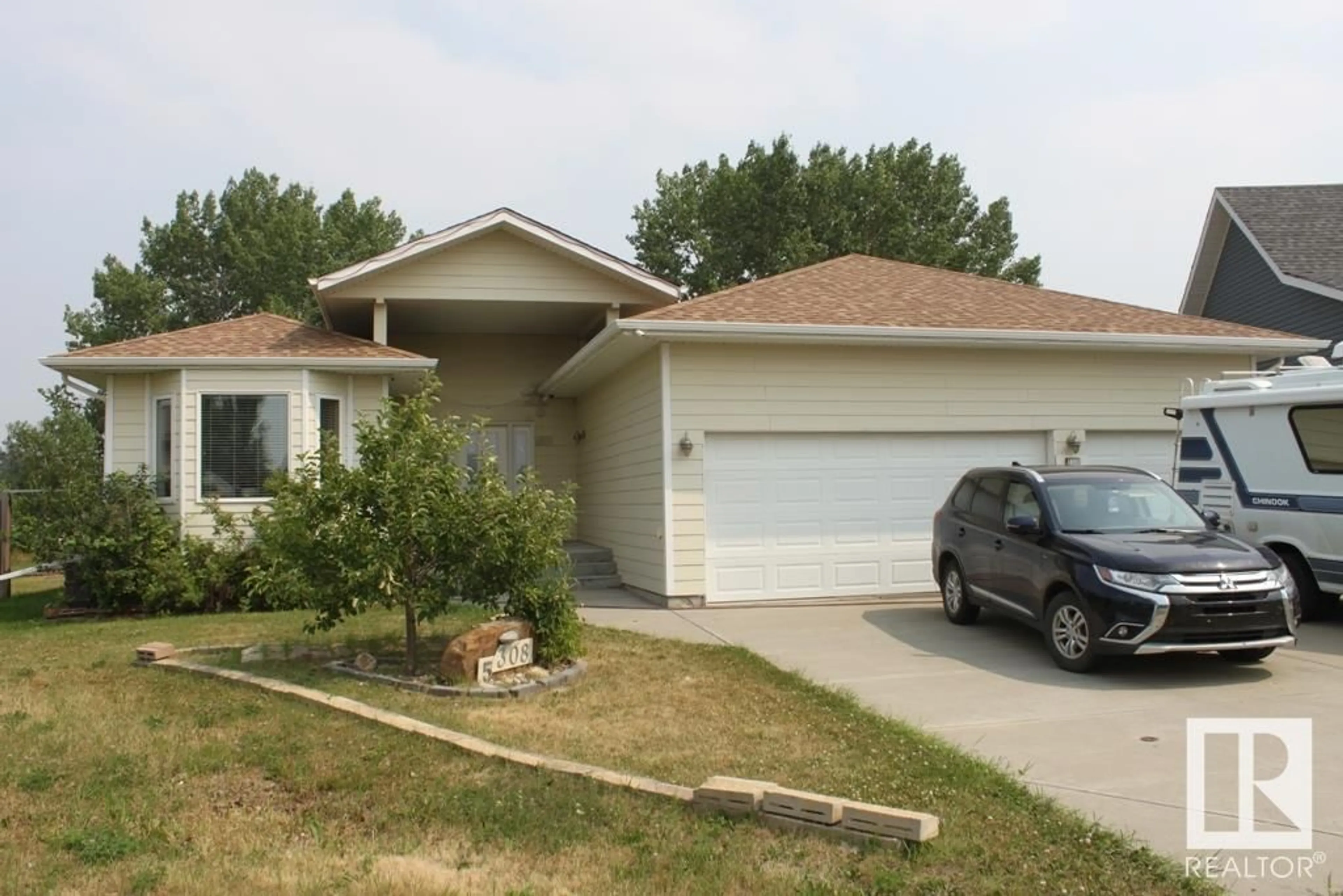 Frontside or backside of a home for 5308 53 ST, Tofield Alberta T0B4J0