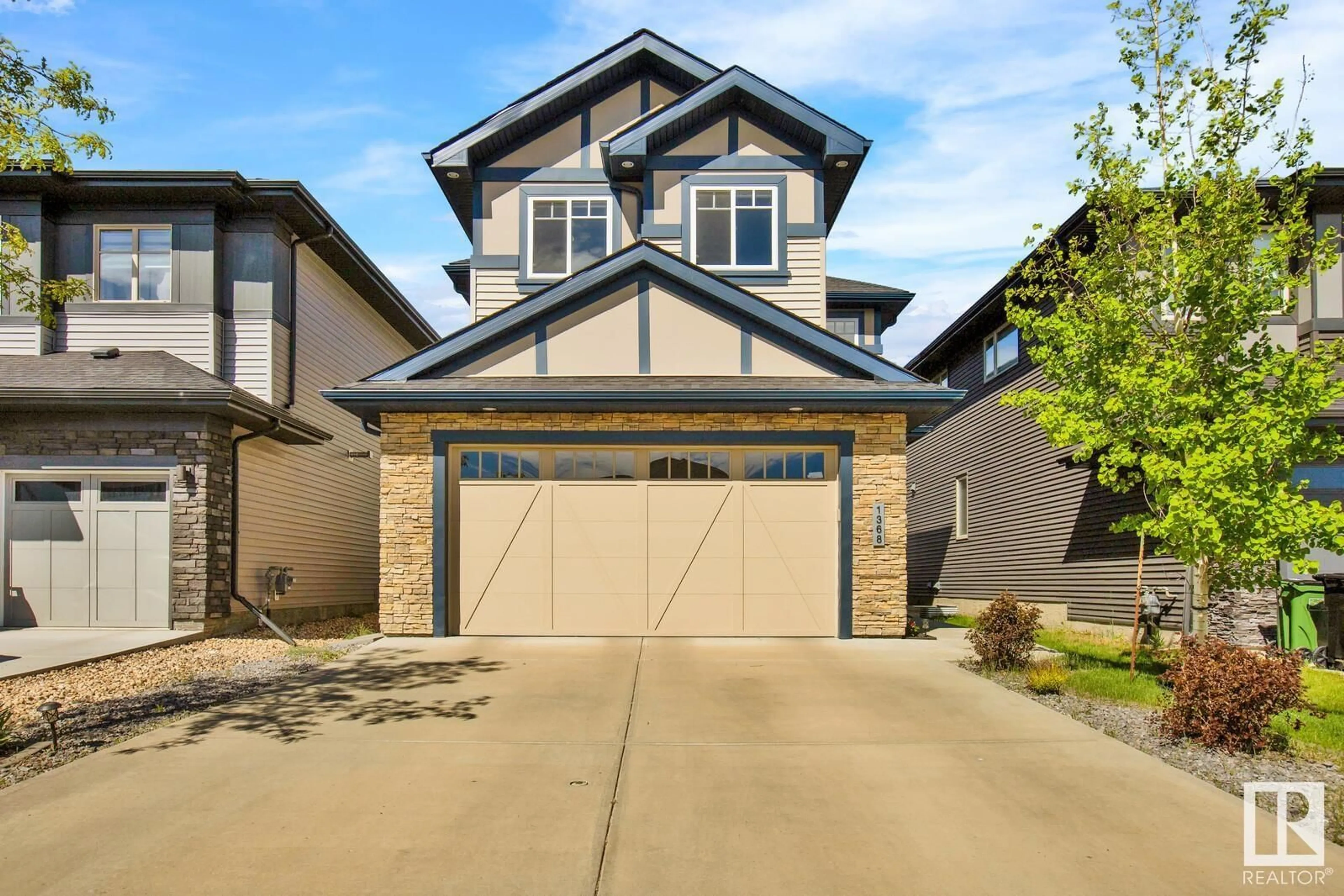 Frontside or backside of a home for 1368 AINSLIE WD SW, Edmonton Alberta T6W3E9