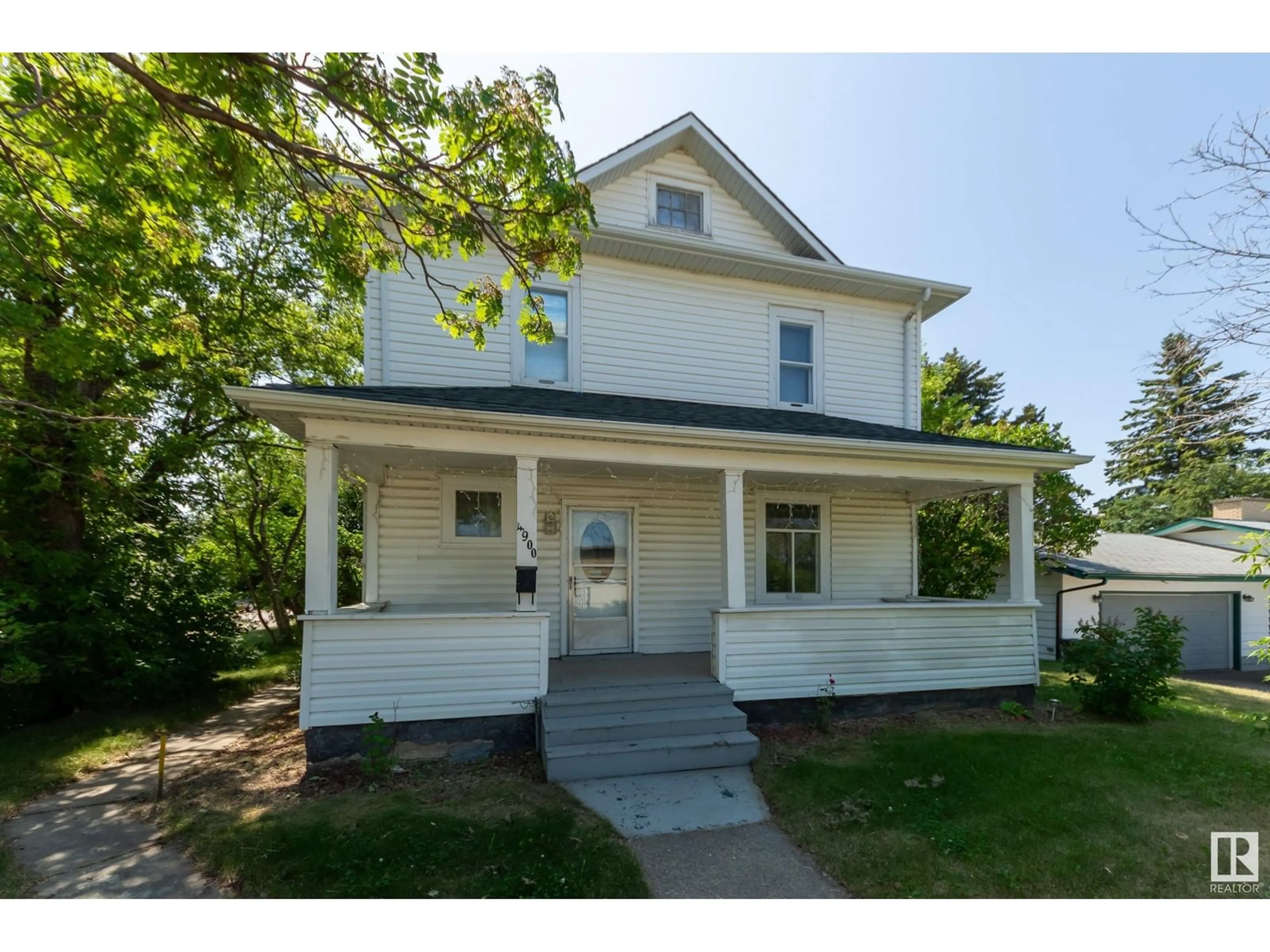 Frontside or backside of a home for 4900 50 AV, Stony Plain Alberta T7Z1C4