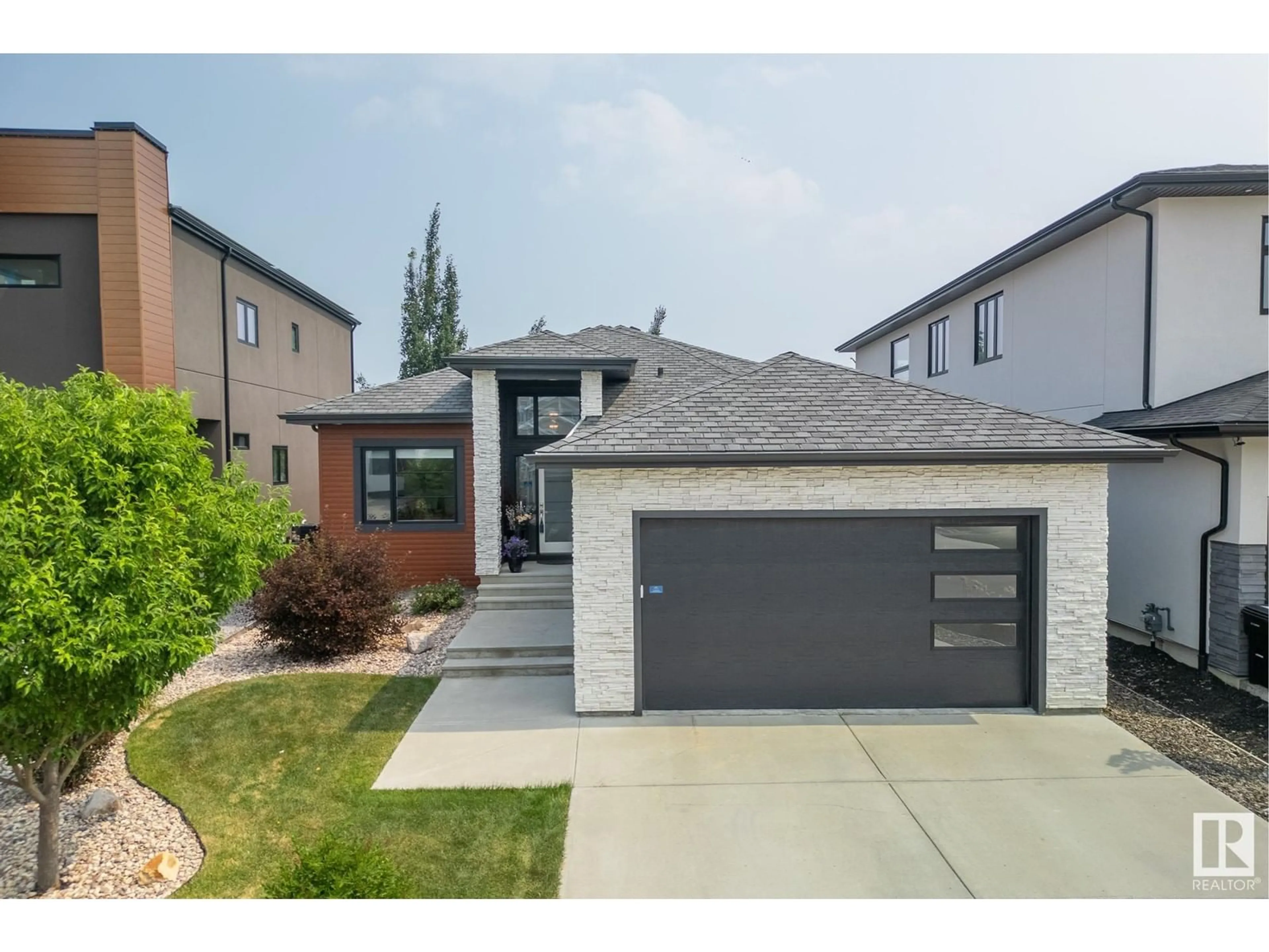 Frontside or backside of a home for 1305 CLEMENT CO NW, Edmonton Alberta T6M0C9