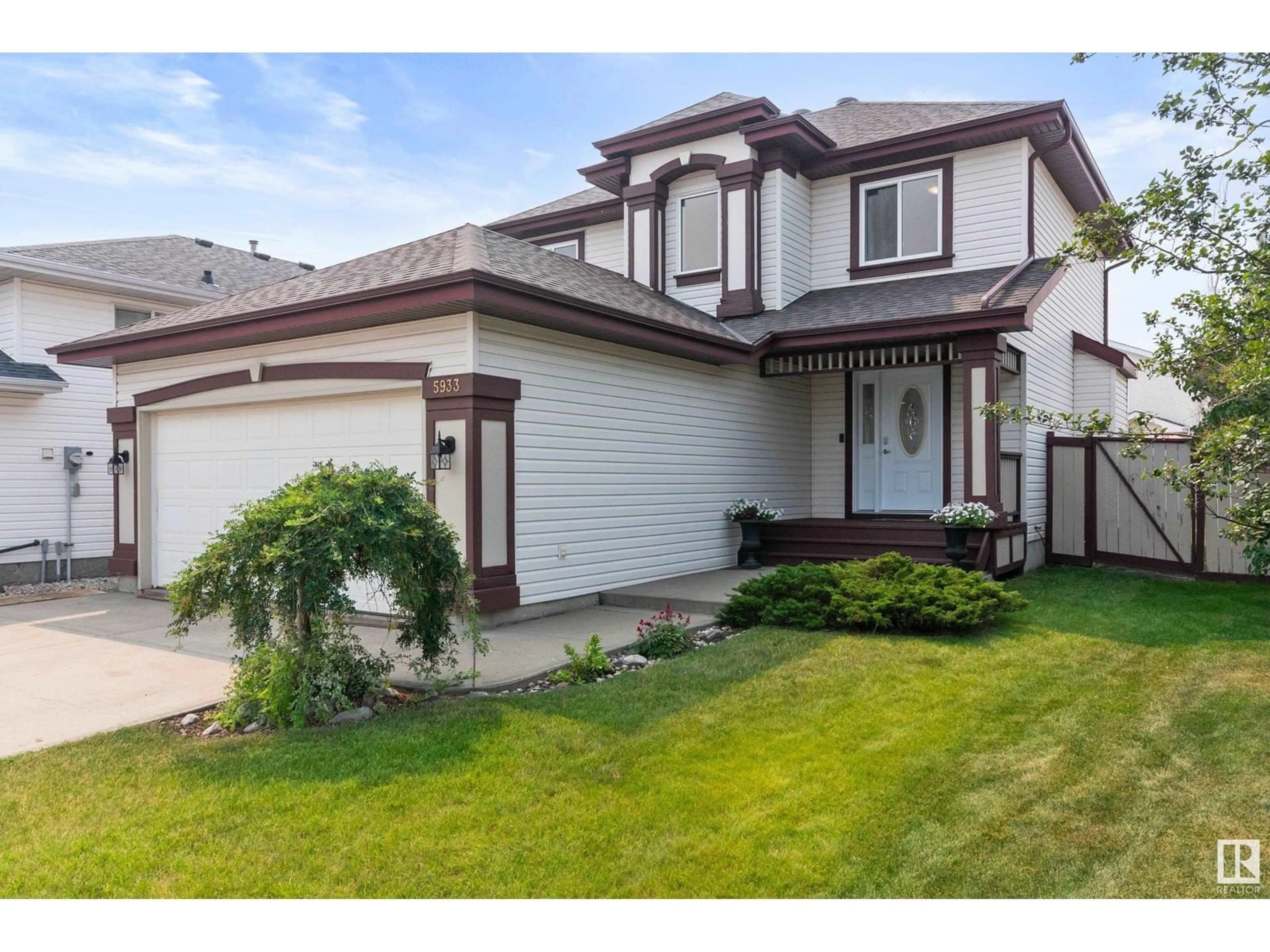 Frontside or backside of a home for 5933 162B AV NW NW, Edmonton Alberta T5Y2V8