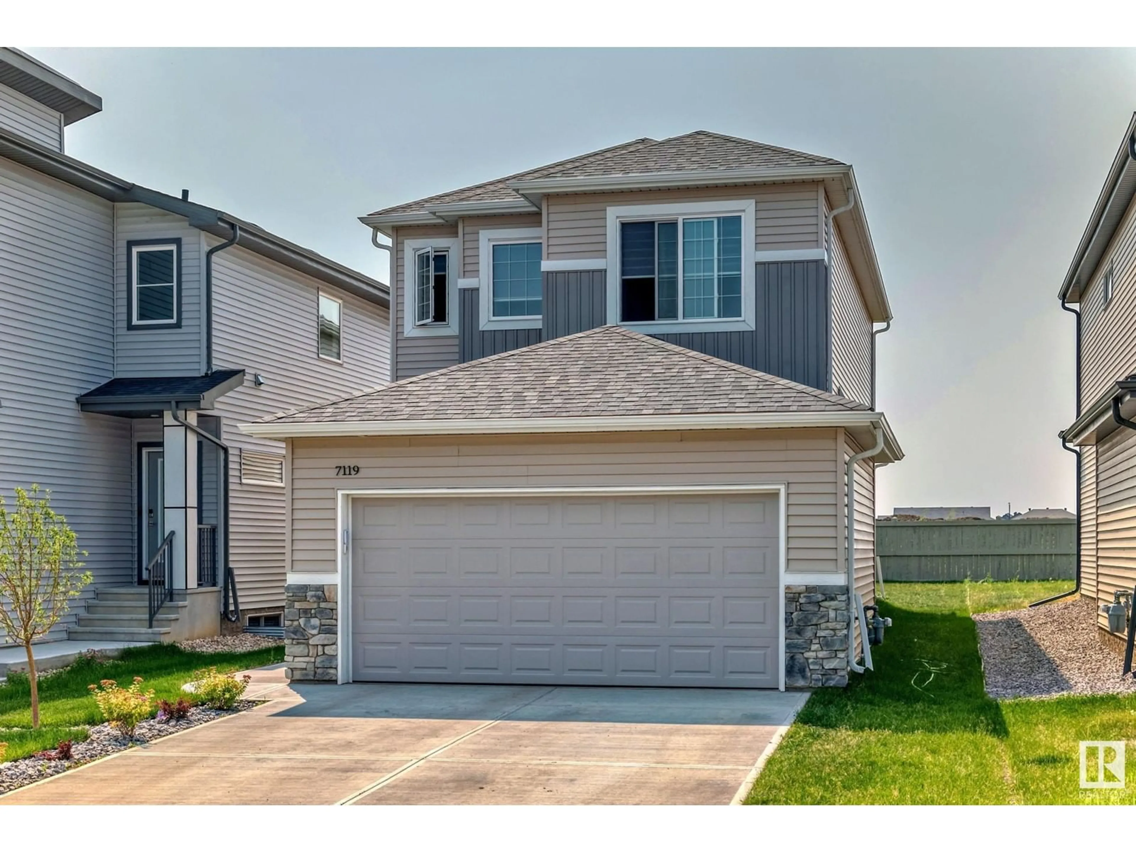 Frontside or backside of a home for 7119 182 AV NW NW, Edmonton Alberta T5Z0V7