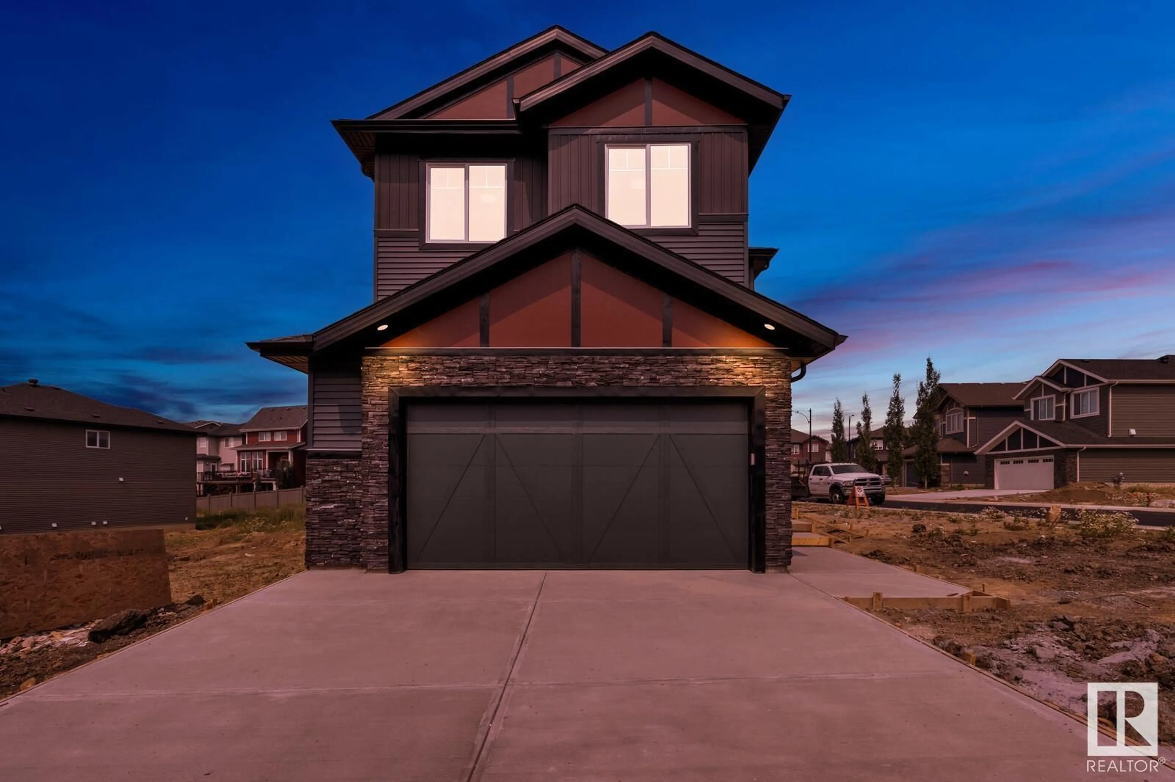 Frontside or backside of a home for 1138 GYRFALCON CR NW NW, Edmonton Alberta T5S0H7