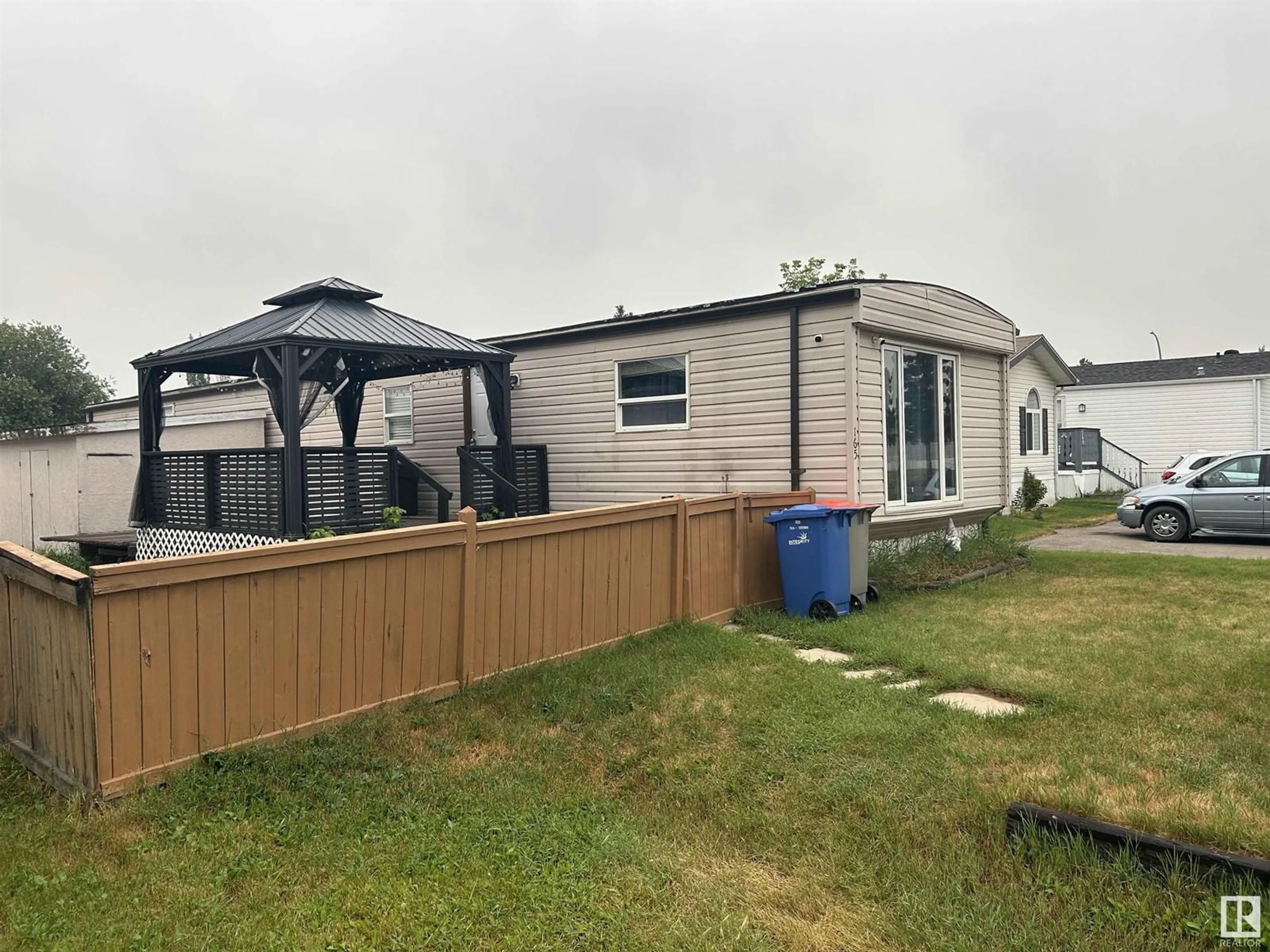 A pic from exterior of the house or condo for #165 53222 Range Rd 272, Rural Parkland County Alberta T7X3N7