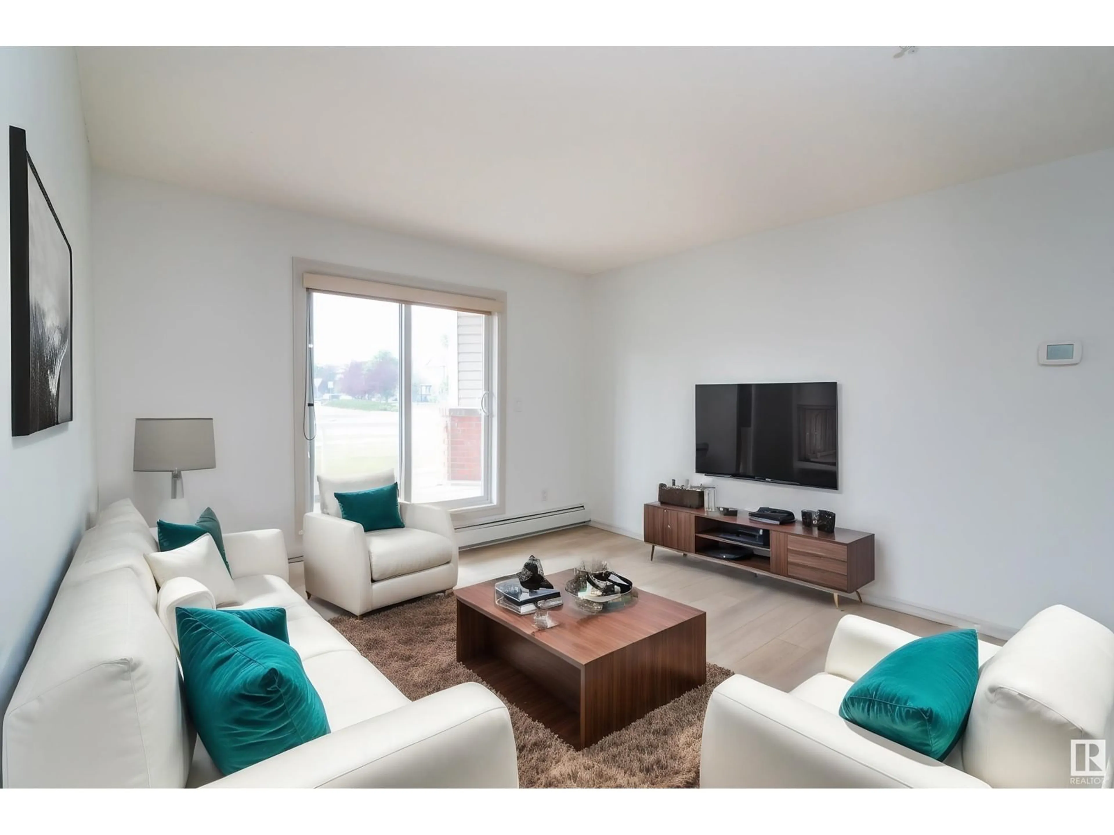 Living room for #118 13830 150 AV NW, Edmonton Alberta T6A1X2