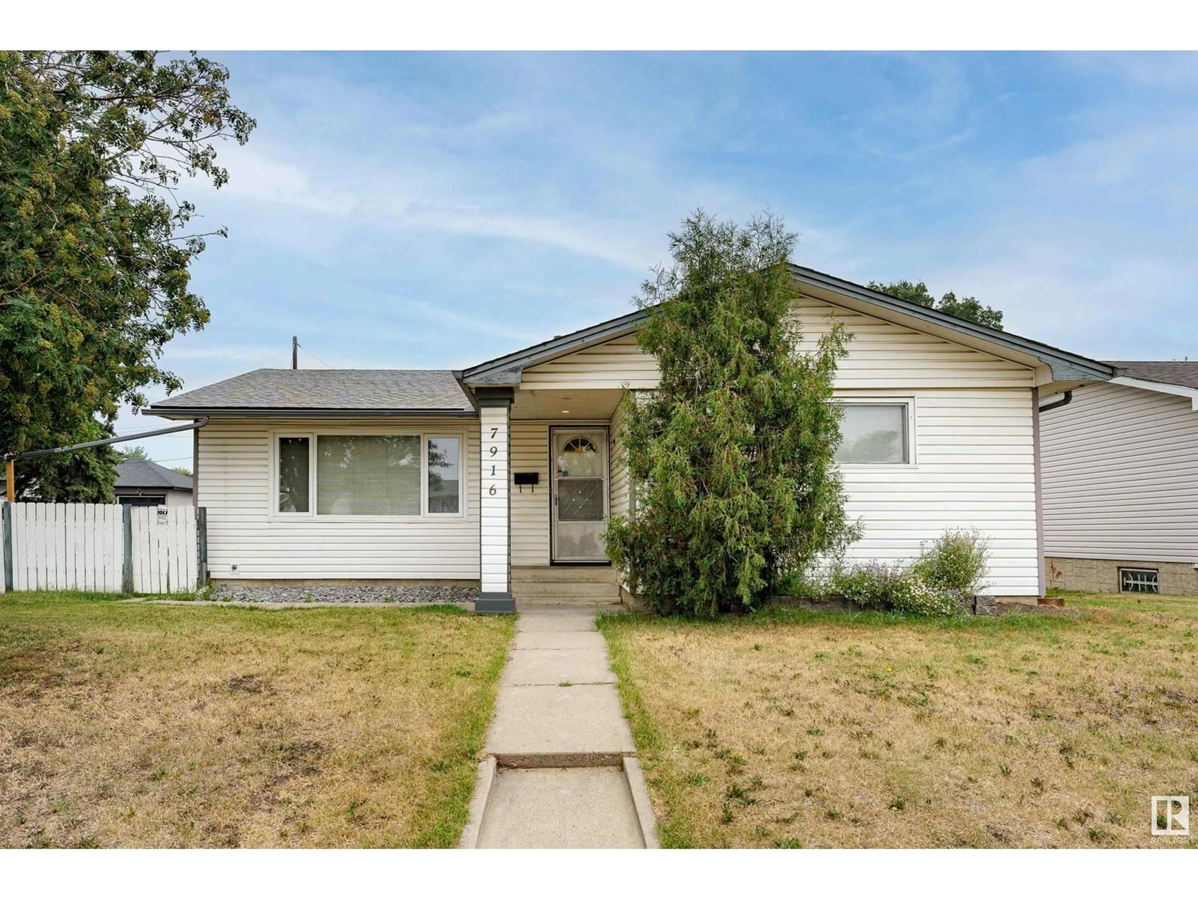 Frontside or backside of a home for 7916 132 AV NW, Edmonton Alberta T5C2B1