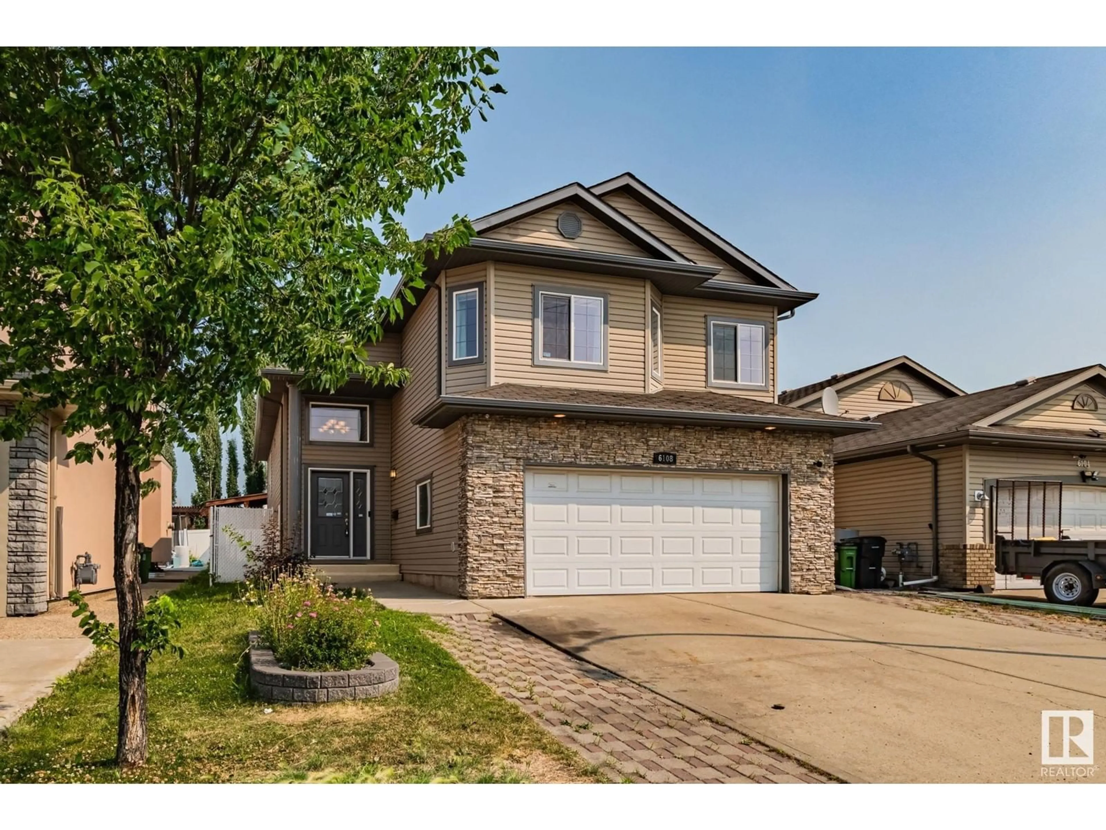 Frontside or backside of a home for 6108 165 AV NW, Edmonton Alberta T5Y0A8
