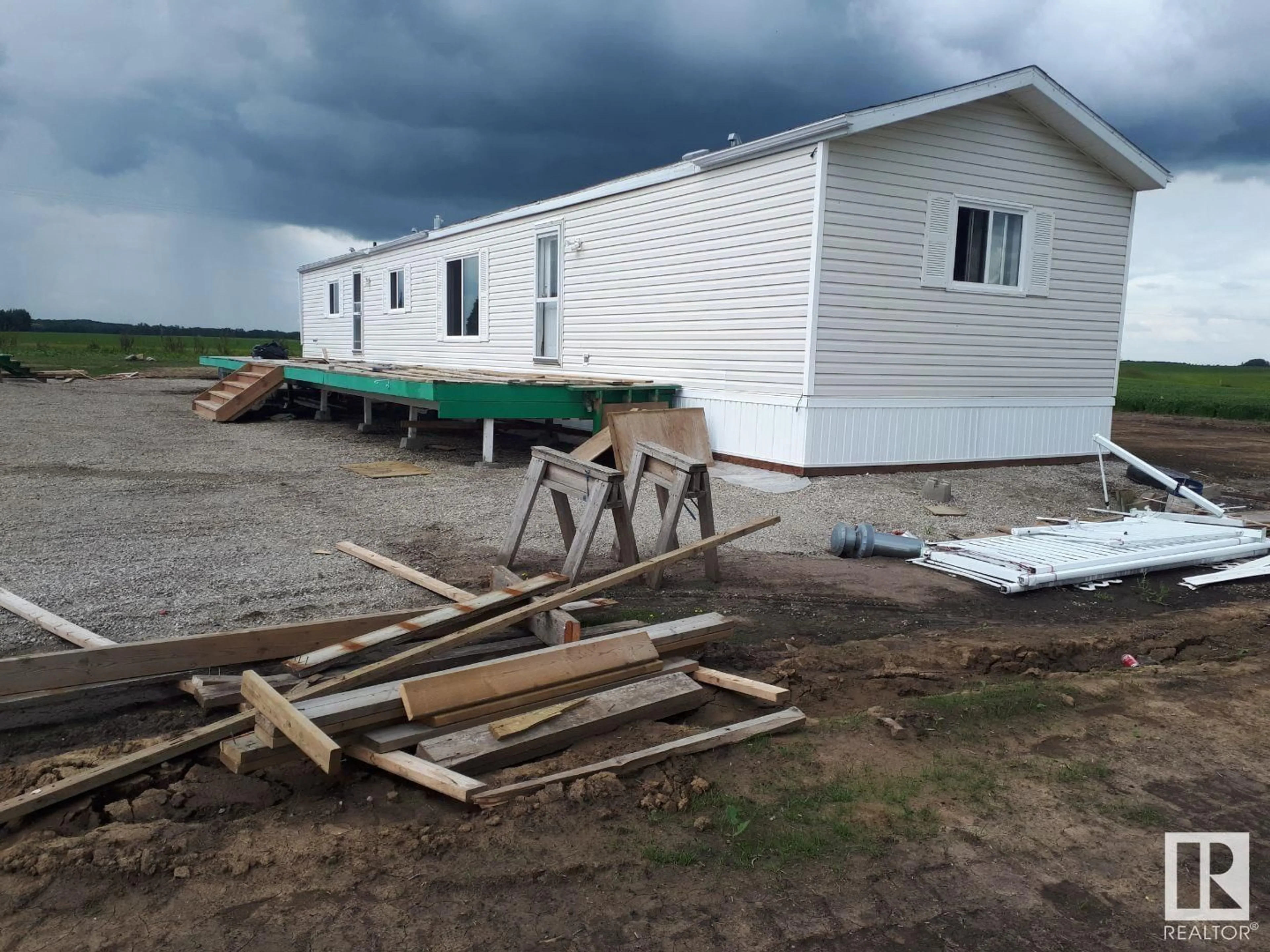 Frontside or backside of a home, the front or back of building for 51203 RANGE ROAD 13, Rural Parkland County Alberta T7Y2B1