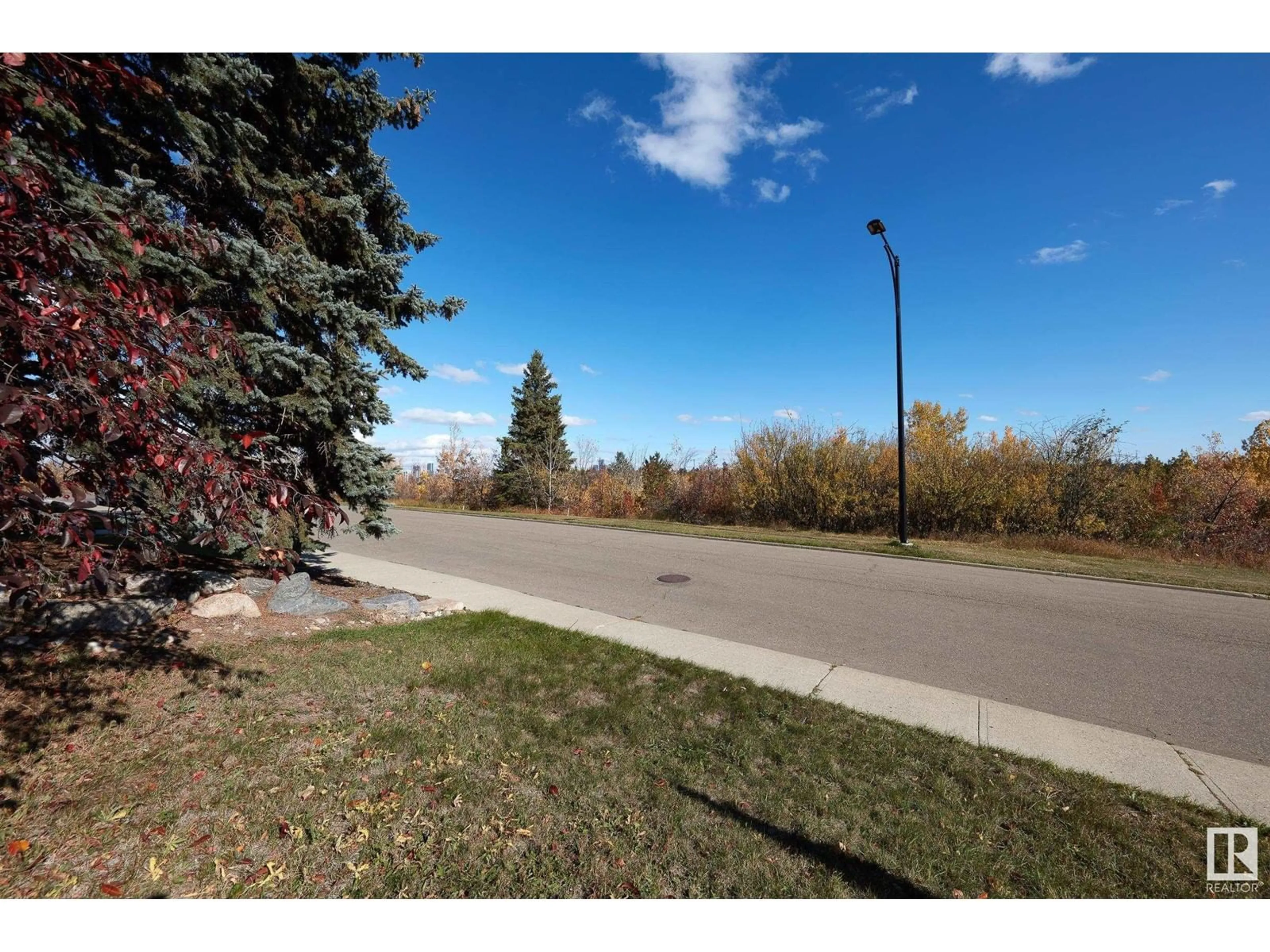 A pic from exterior of the house or condo, the street view for 8404/8406 134 ST NW, Edmonton Alberta T5R0B4