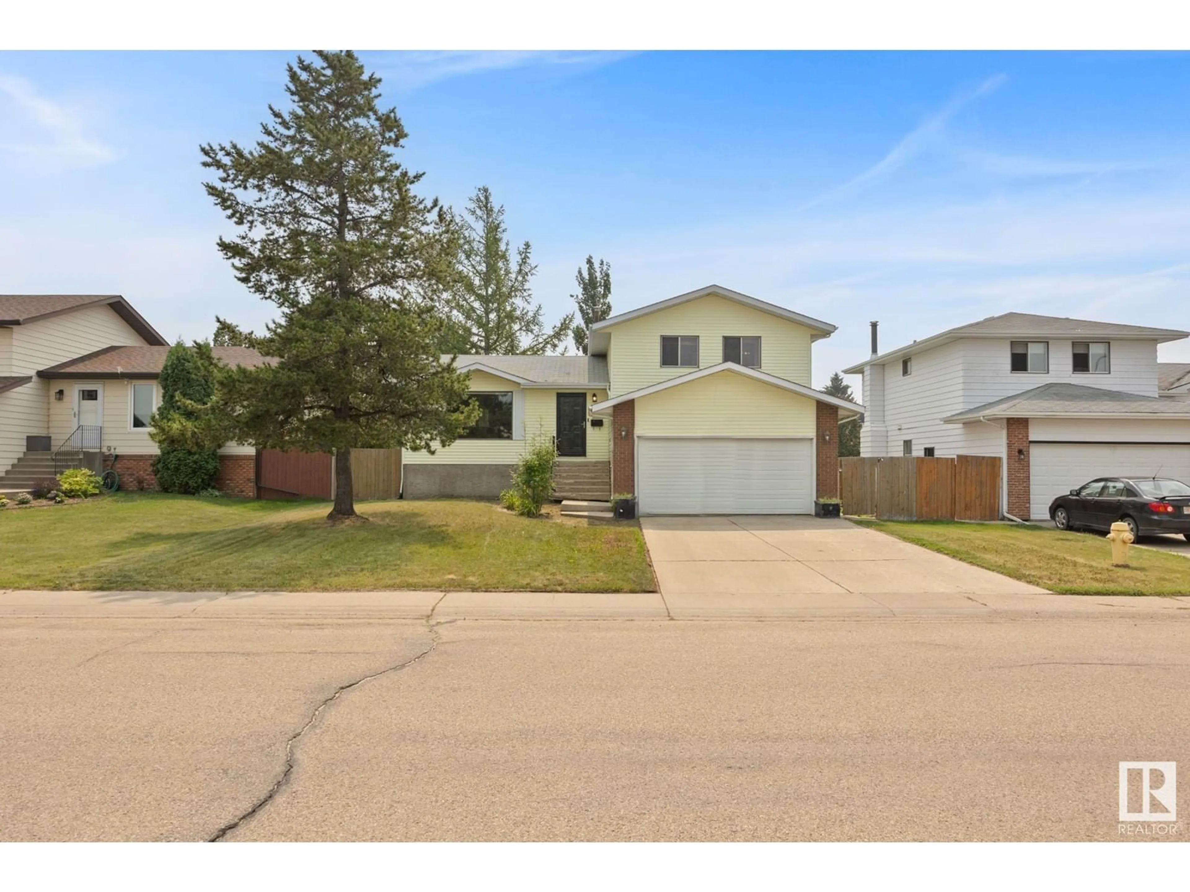 Frontside or backside of a home for 574 Sunnydale RD, Morinville Alberta T8R1C4