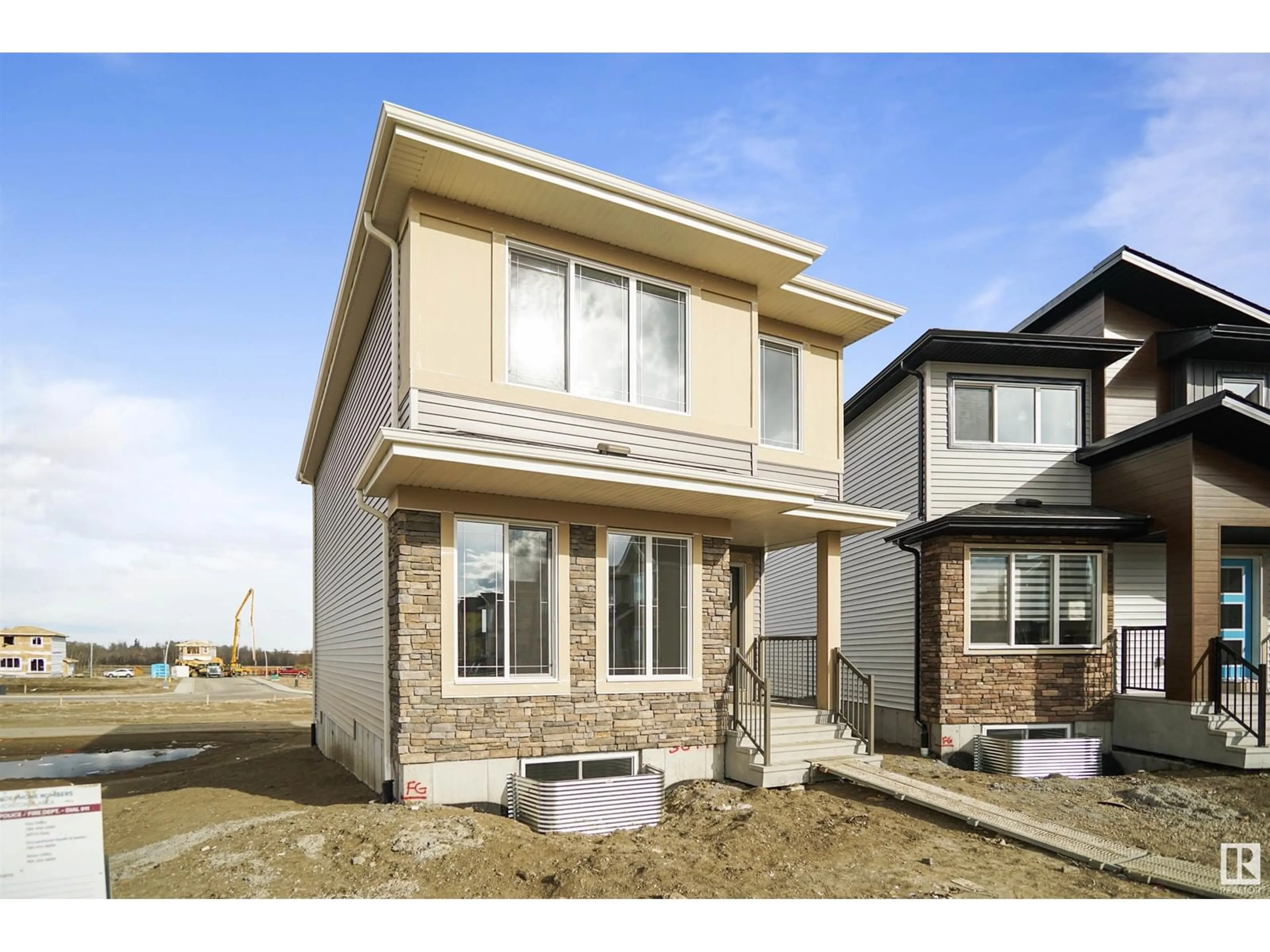 Frontside or backside of a home for 17307 6 ST NE, Edmonton Alberta T5Y4G1