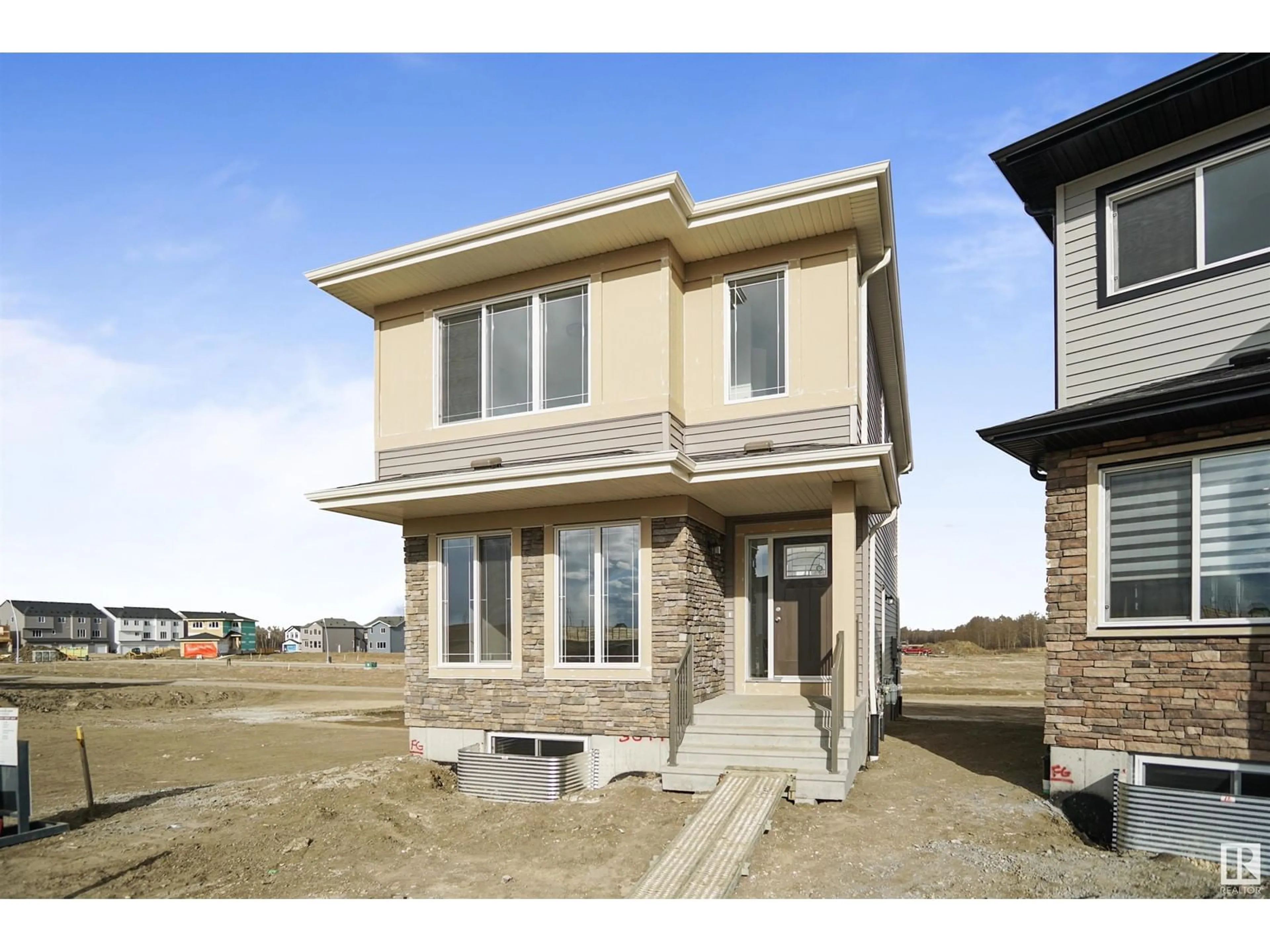 Frontside or backside of a home for 17307 6 ST NE, Edmonton Alberta T5Y4G1