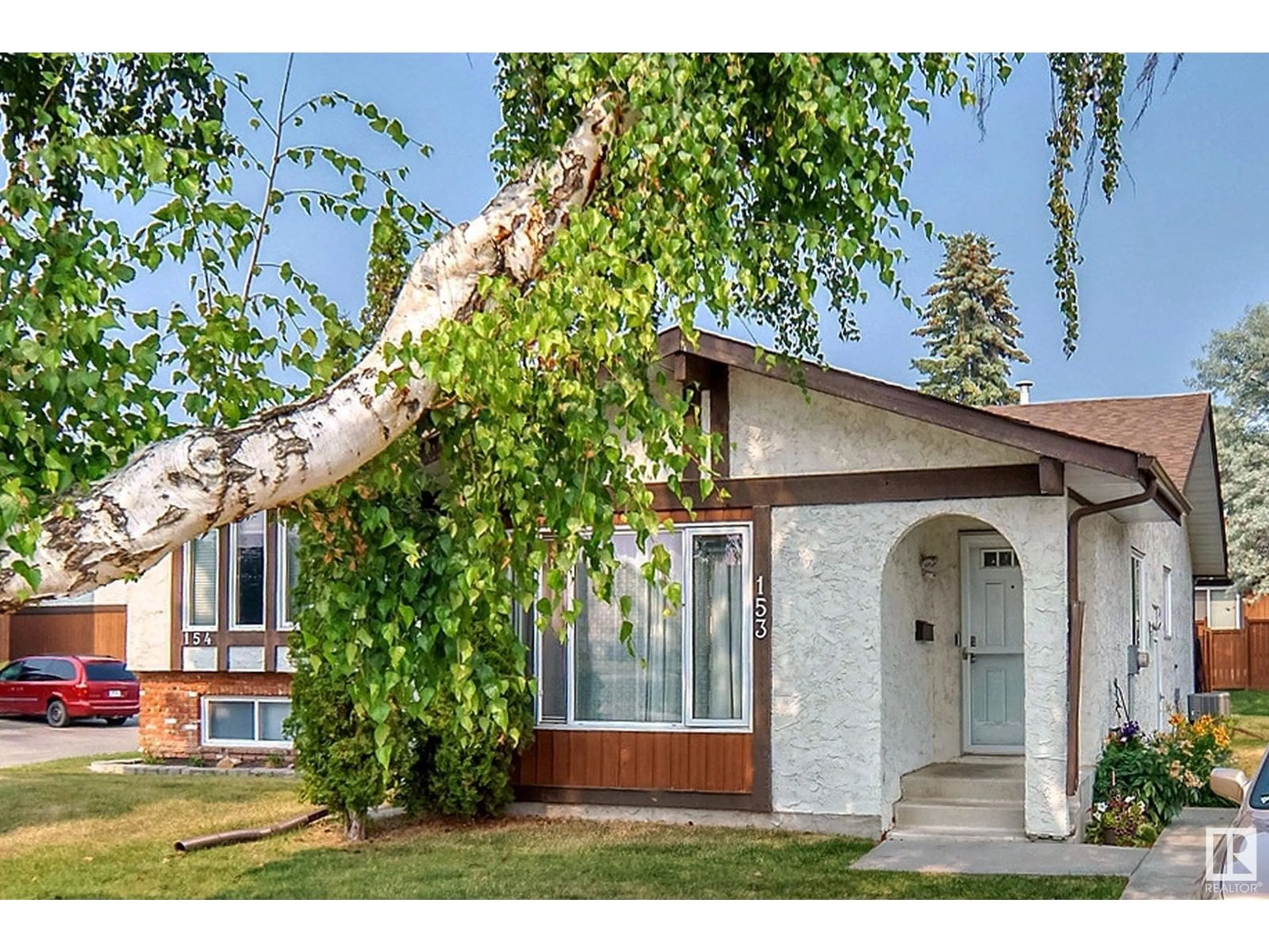 Frontside or backside of a home for #153 16725 106 ST NW, Edmonton Alberta T5X5G5