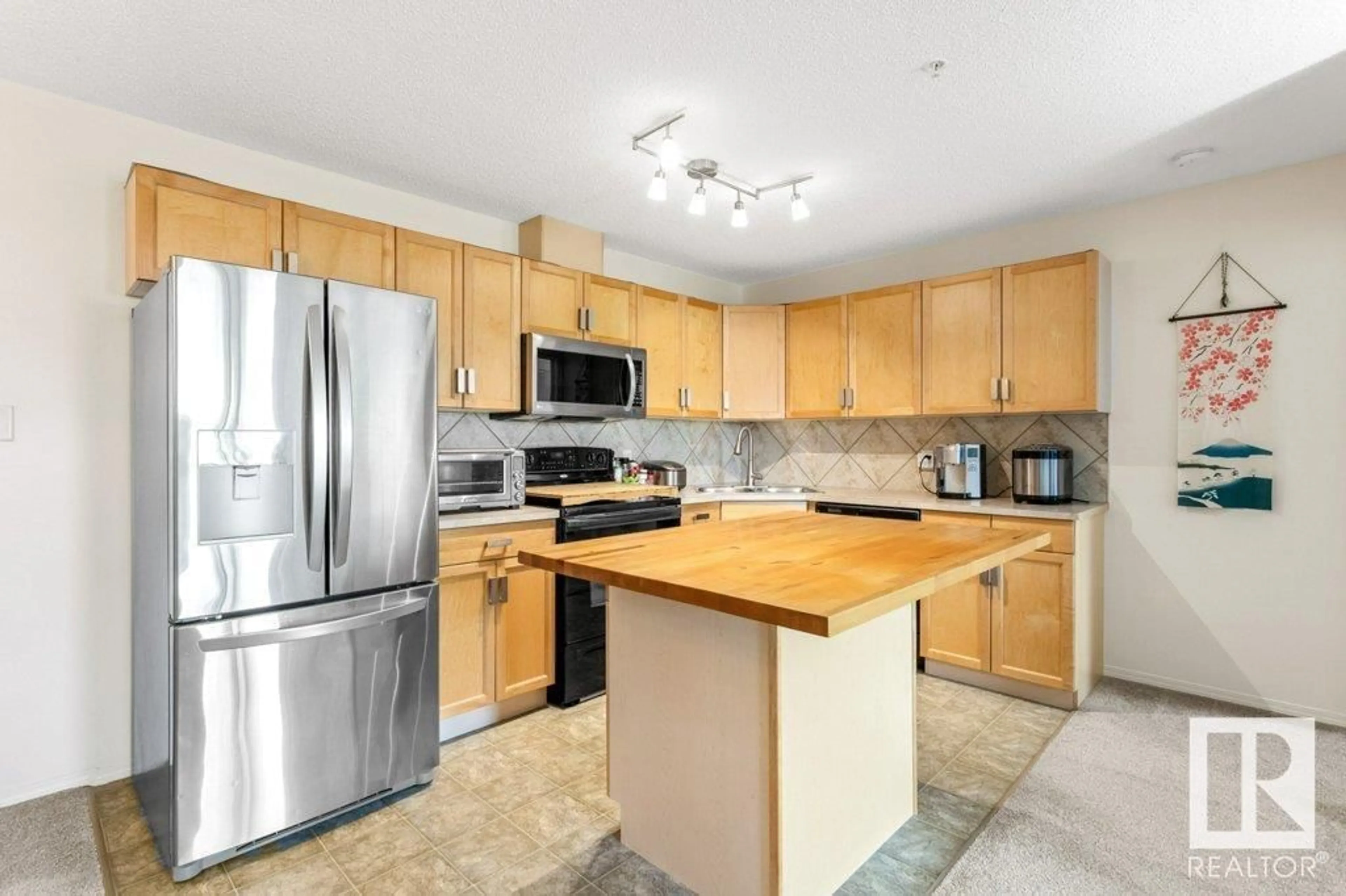 Standard kitchen for #422 2430 GUARDIAN RD NW, Edmonton Alberta T5T6X9