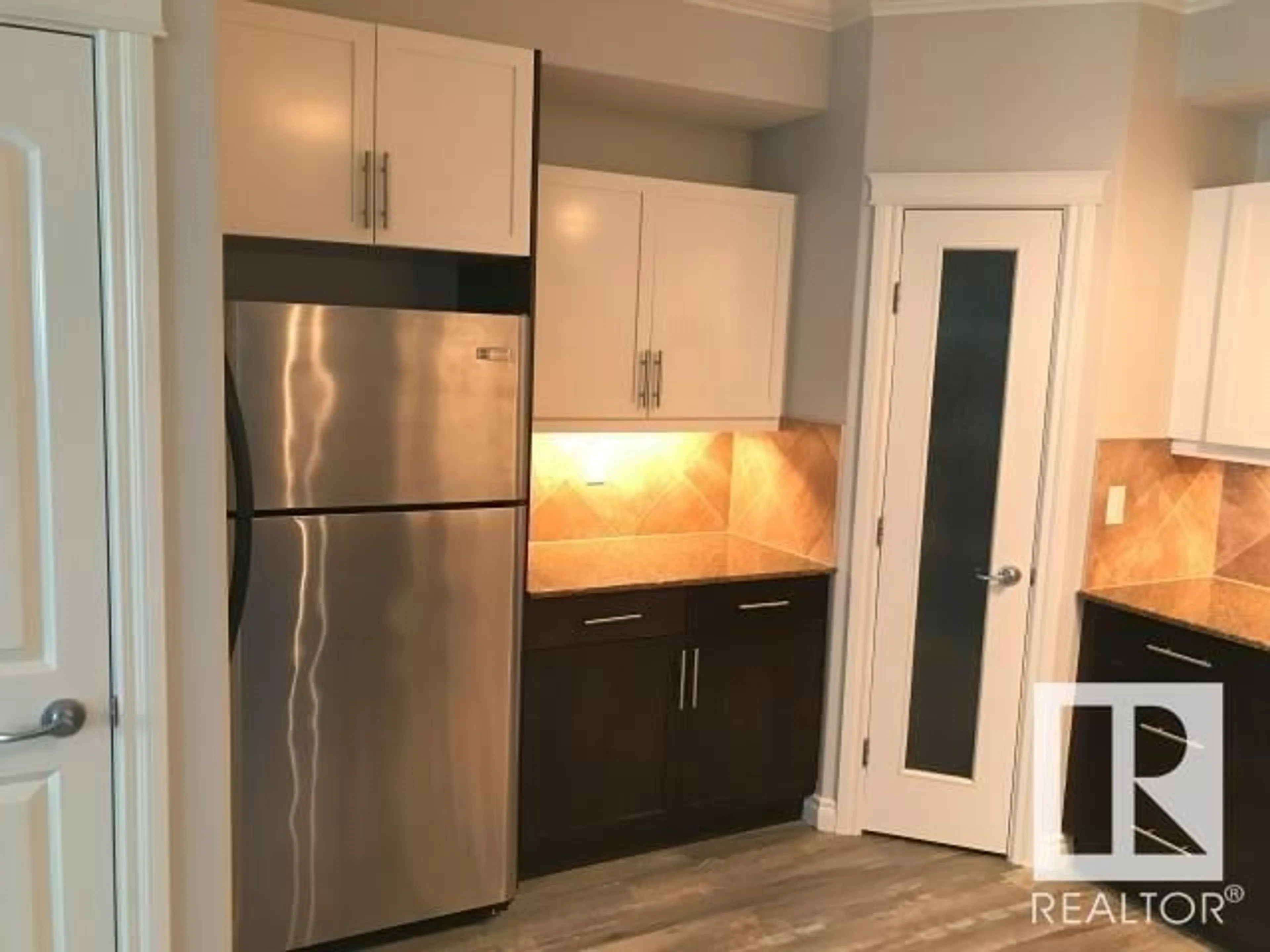 Open concept kitchen, unknown for 236 10121 80 AV NW, Edmonton Alberta T6E0B9