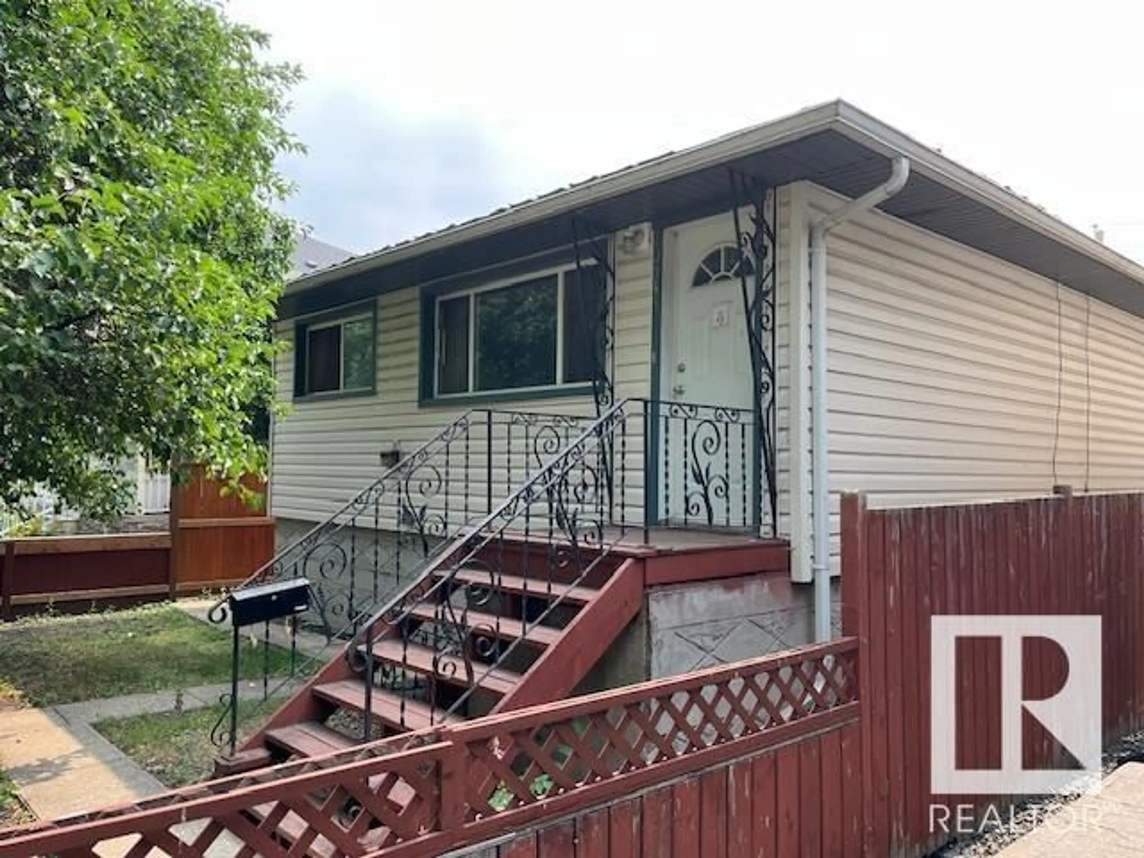 Frontside or backside of a home for 10545 67 AV NW, Edmonton Alberta T6H1Z4