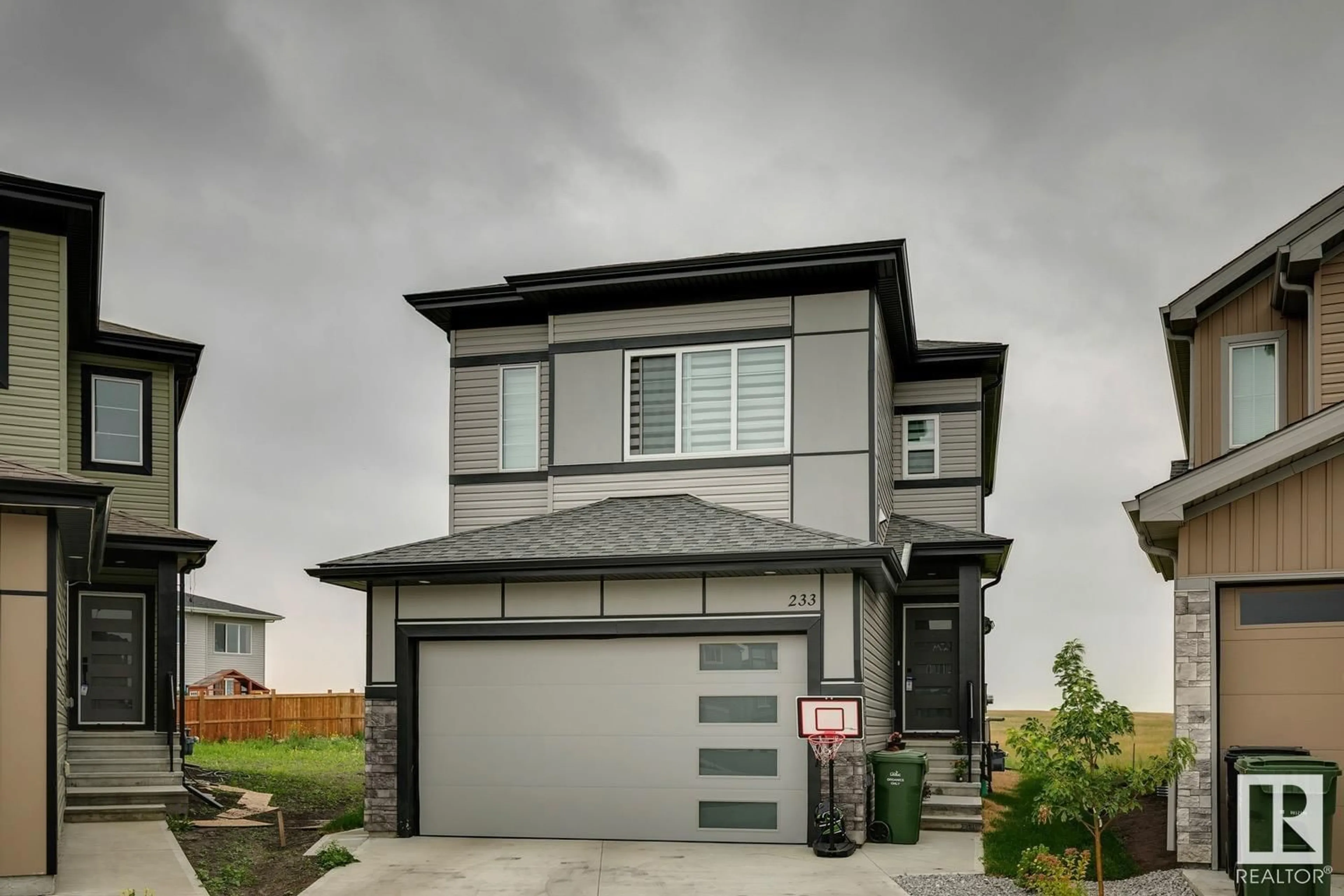 Frontside or backside of a home for 233 Rolston WD, Leduc Alberta T9E1N1