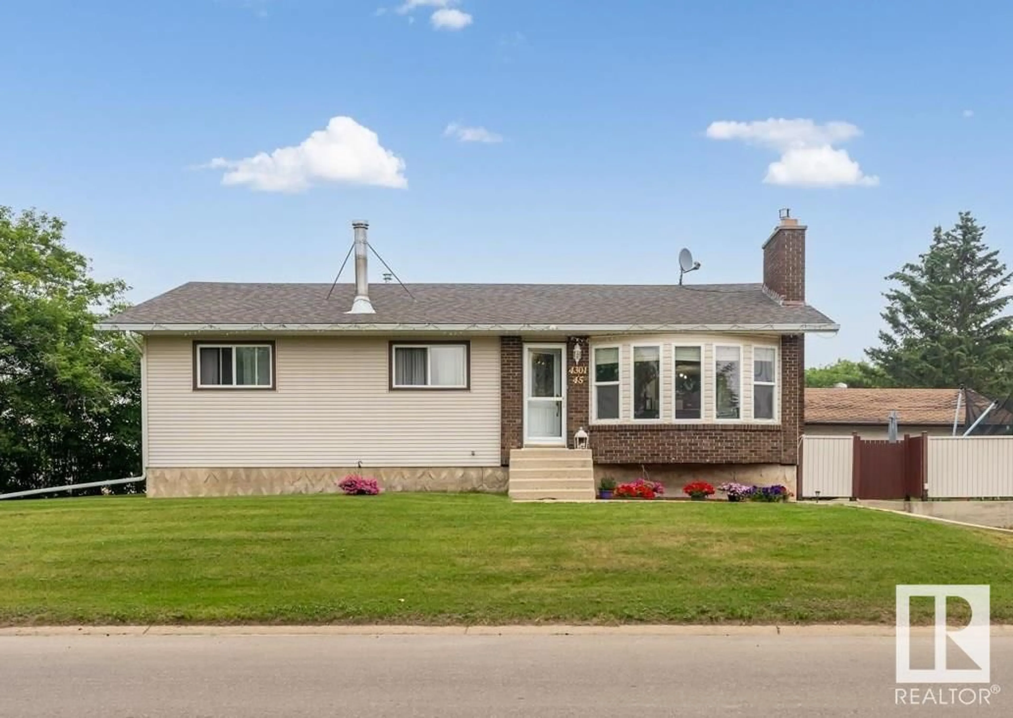 Frontside or backside of a home for 4301 45 ST, Bonnyville Town Alberta T9N1R5