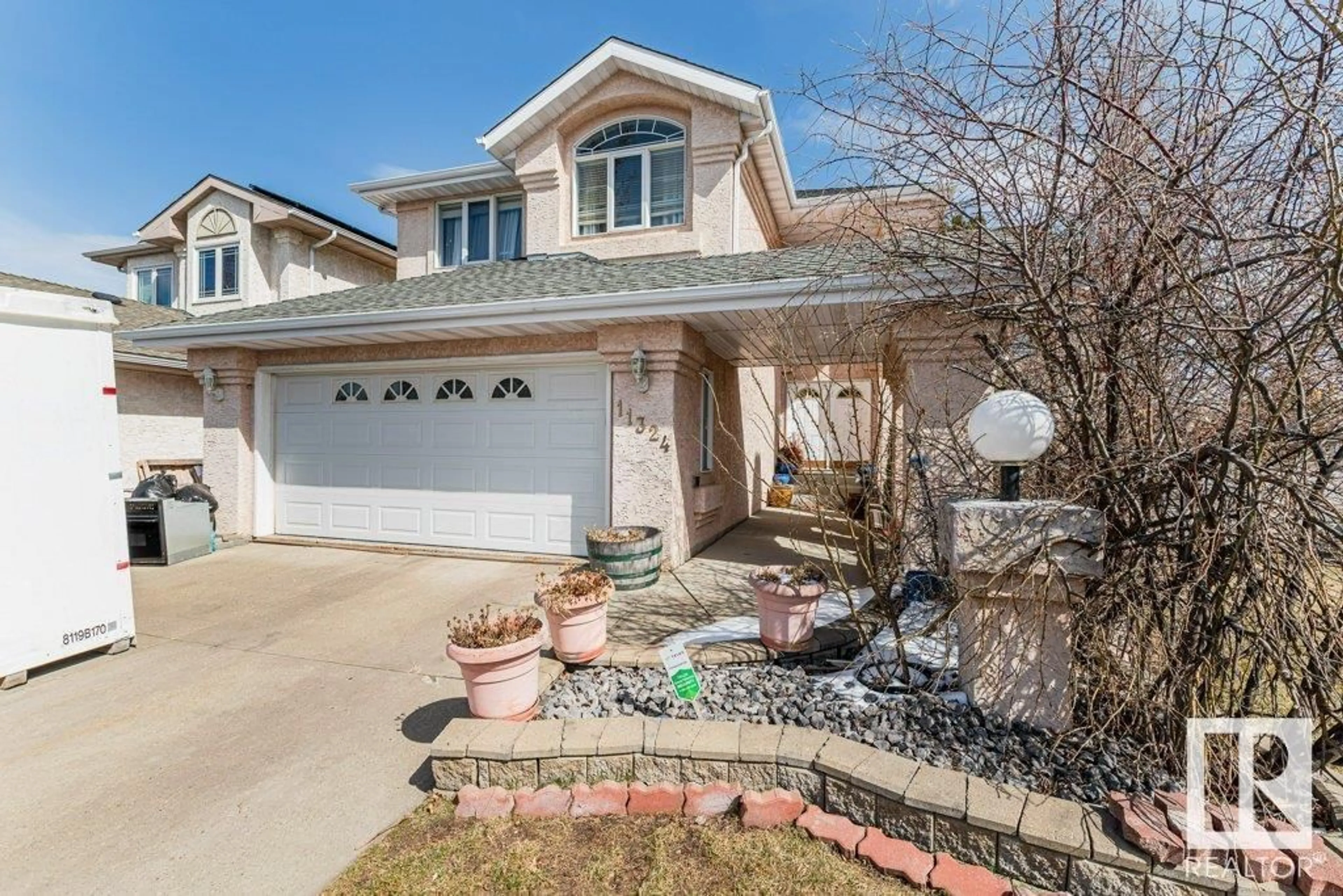 Frontside or backside of a home for 11324 10 AV NW, Edmonton Alberta T6J6S9