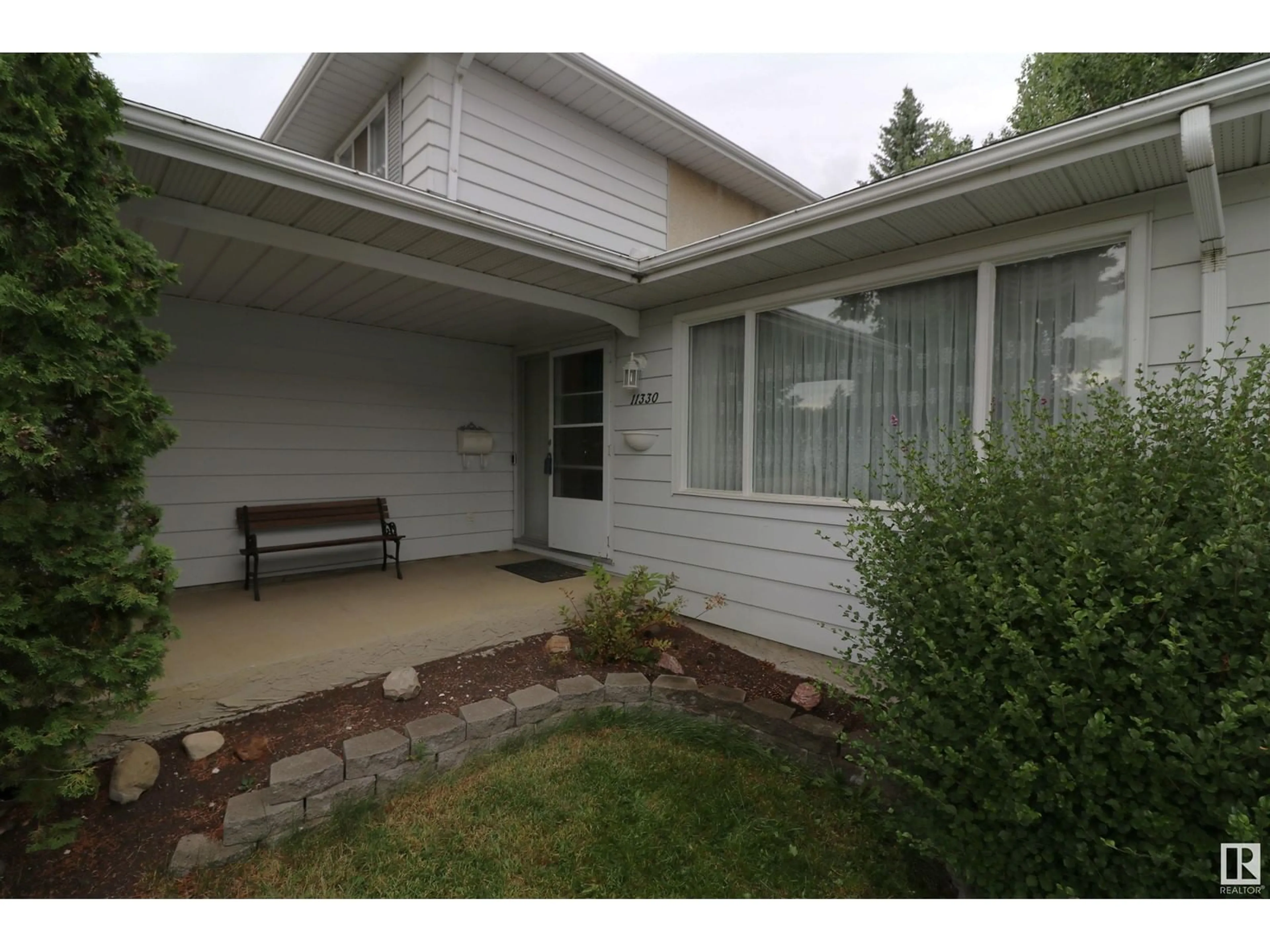 Frontside or backside of a home for 11330 33A AV NW, Edmonton Alberta T6J3T6