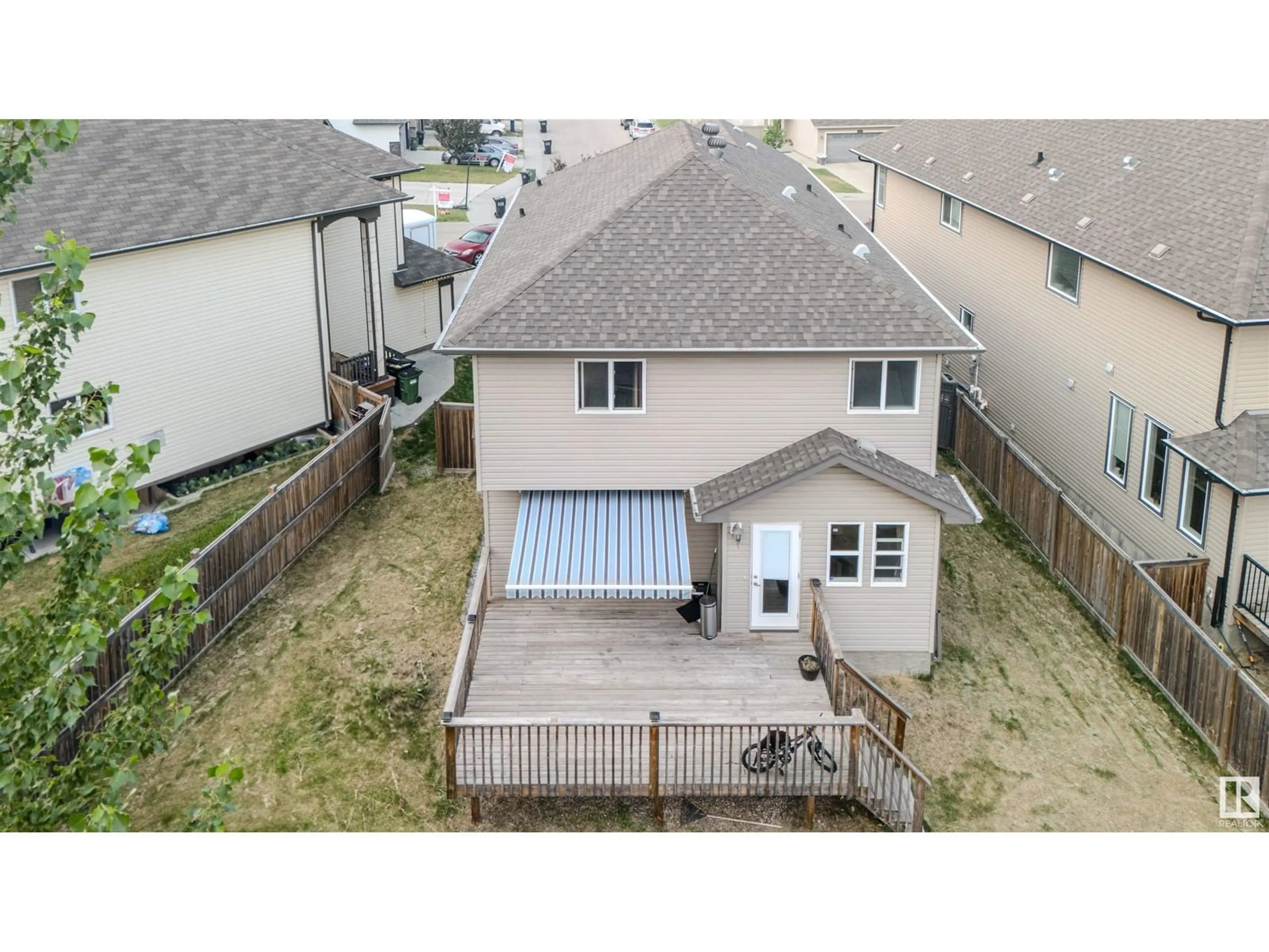 Frontside or backside of a home, the fenced backyard for 1575 36 AV NW NW, Edmonton Alberta T6T0M5