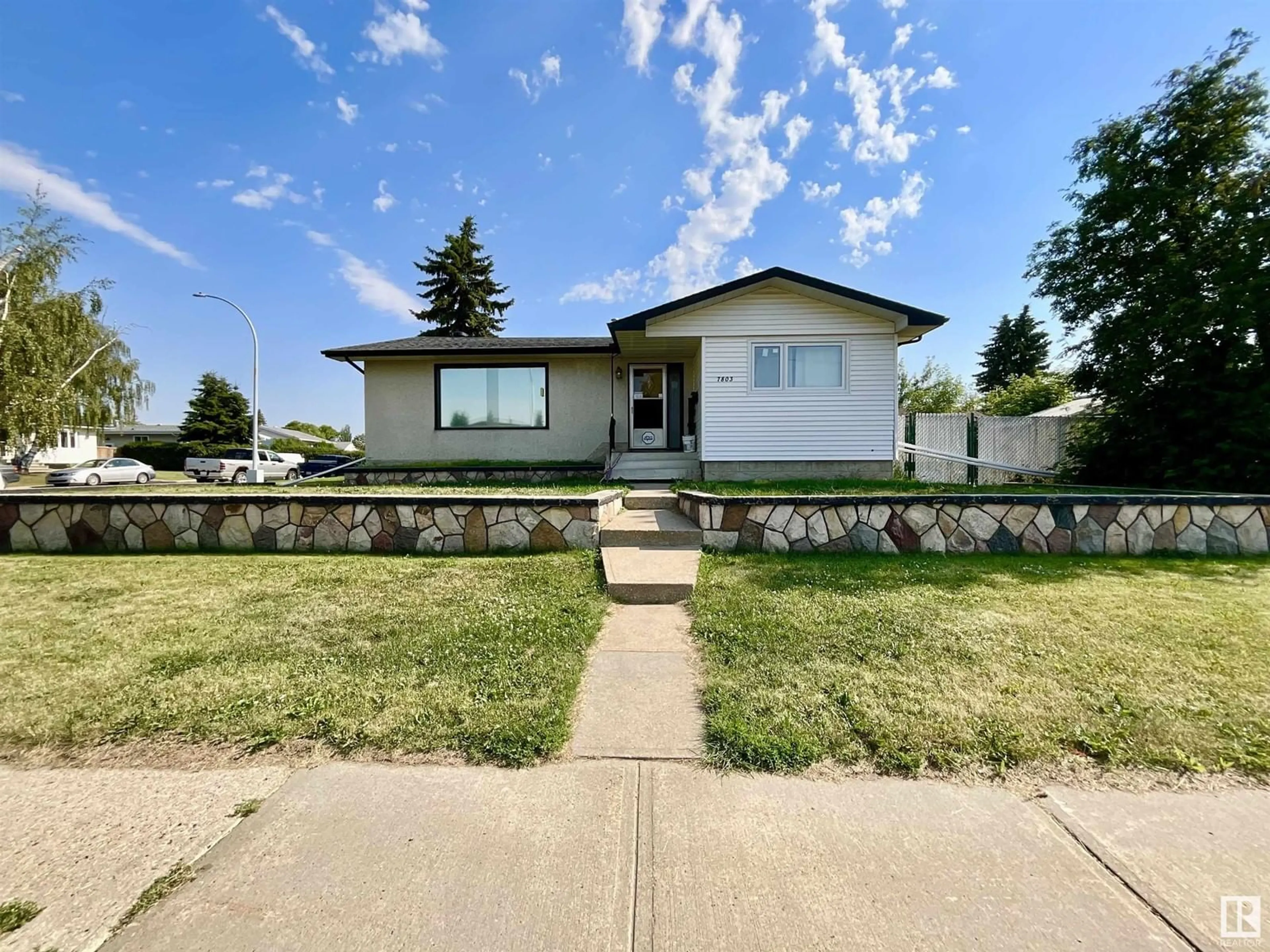 Frontside or backside of a home for 7803 143 AV NW, Edmonton Alberta T5C2P7