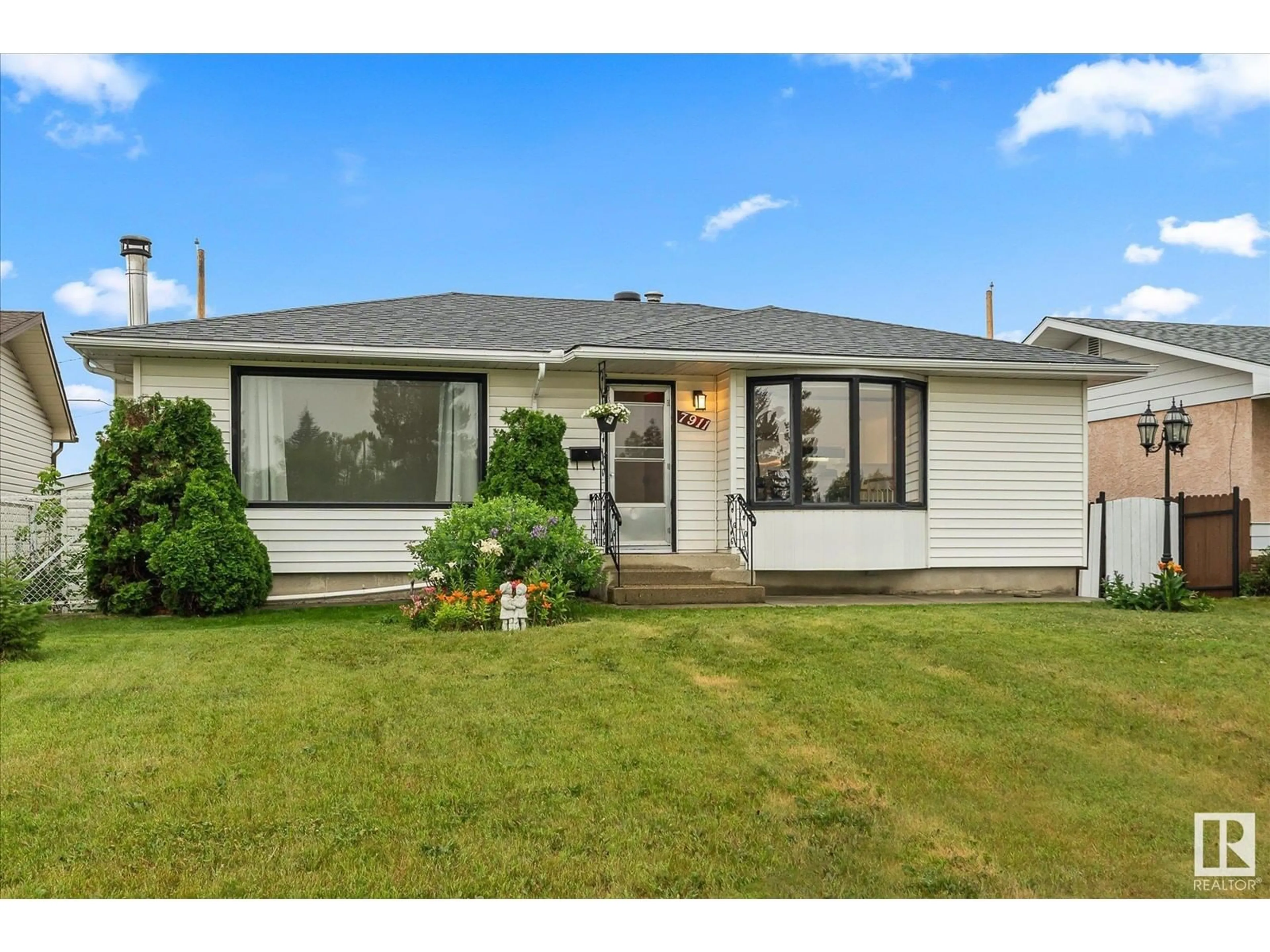 Frontside or backside of a home for 7911 129 AV NW, Edmonton Alberta T5C1W6