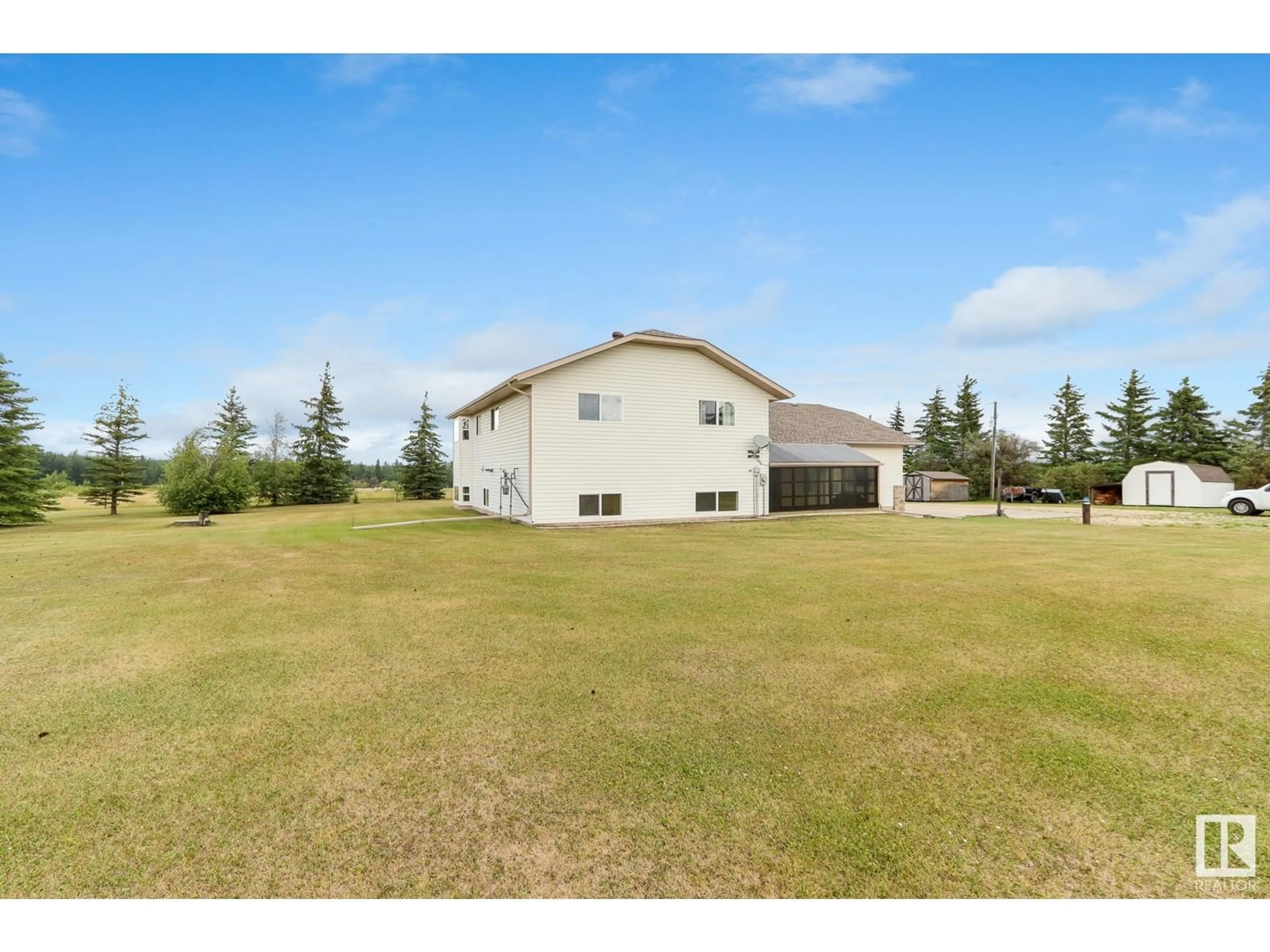 A pic from exterior of the house or condo, the fenced backyard for 7425 Township Rd 494, Rural Brazeau County Alberta T7A0C1