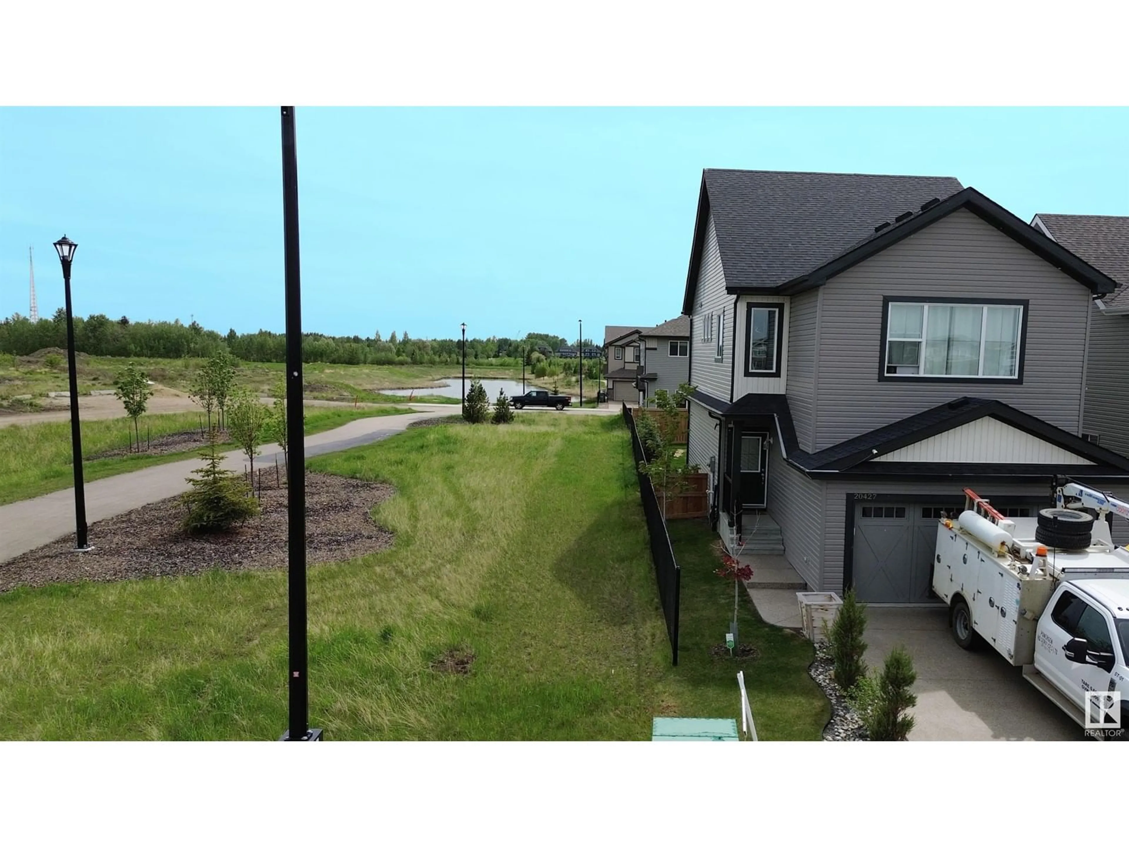 Frontside or backside of a home for 20427 99 AV NW, Edmonton Alberta T5T7L5