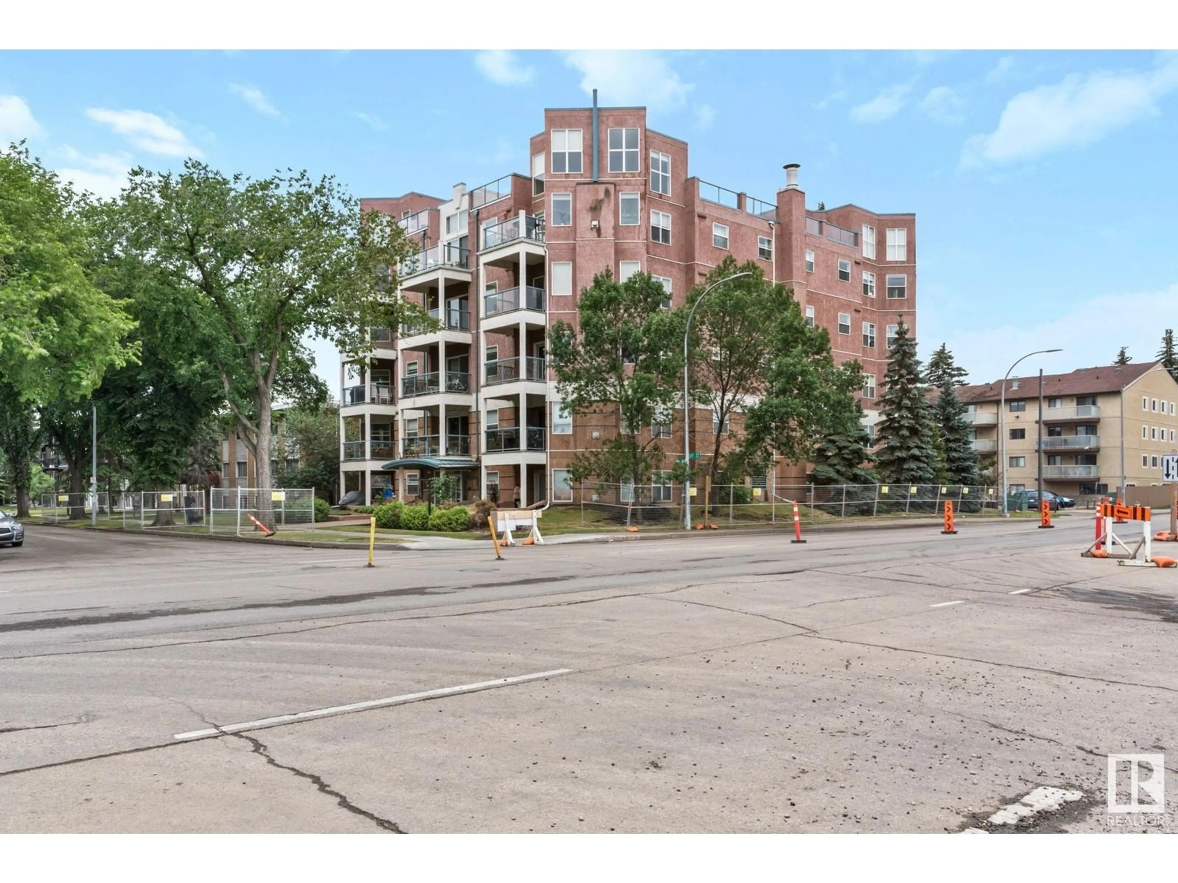 A pic from exterior of the house or condo, the street view for #101 10346 117 ST NW, Edmonton Alberta T5K2Y7