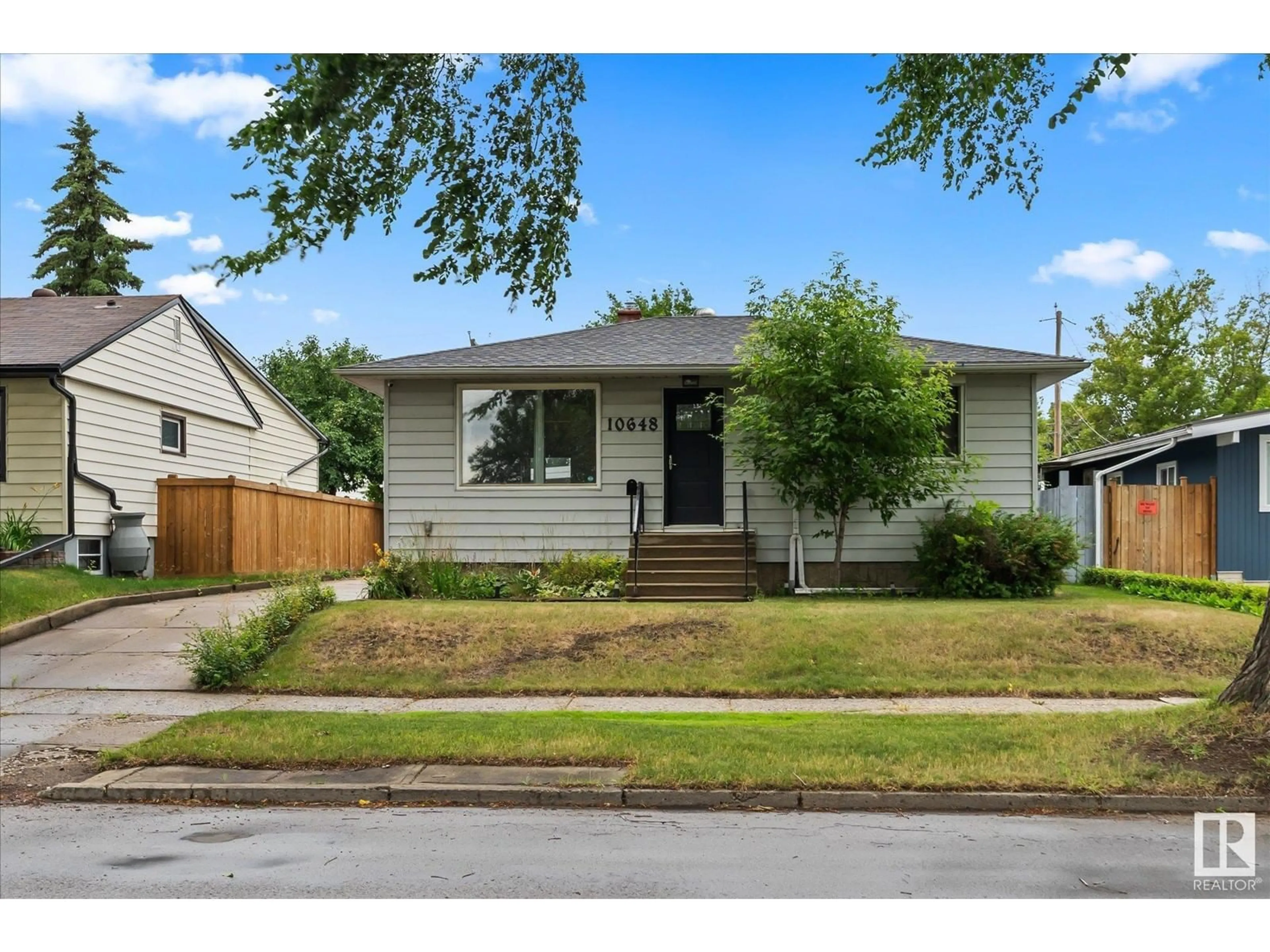 Frontside or backside of a home for 10648 79 ST NW, Edmonton Alberta T6A3H4