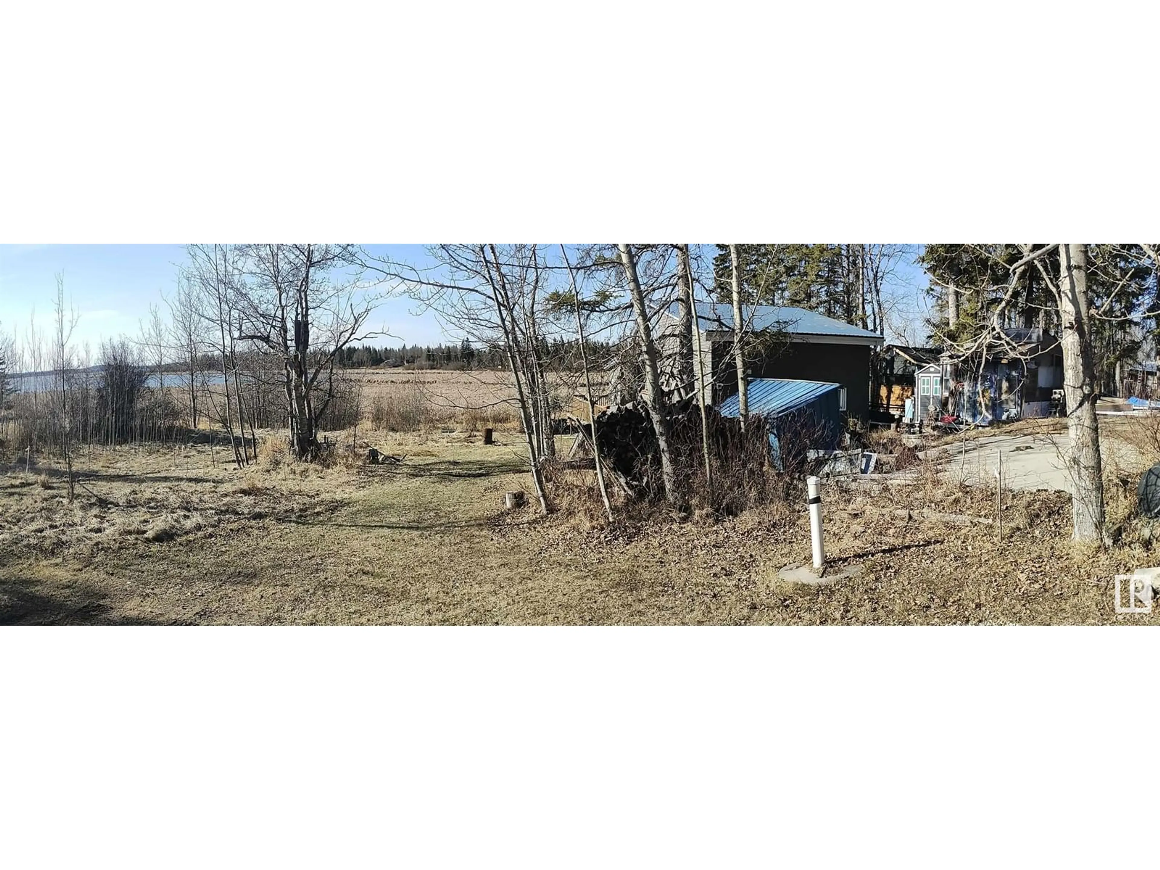 Fenced yard for 837 West Cove Drive, Rural Lac Ste. Anne County Alberta T0E1V0