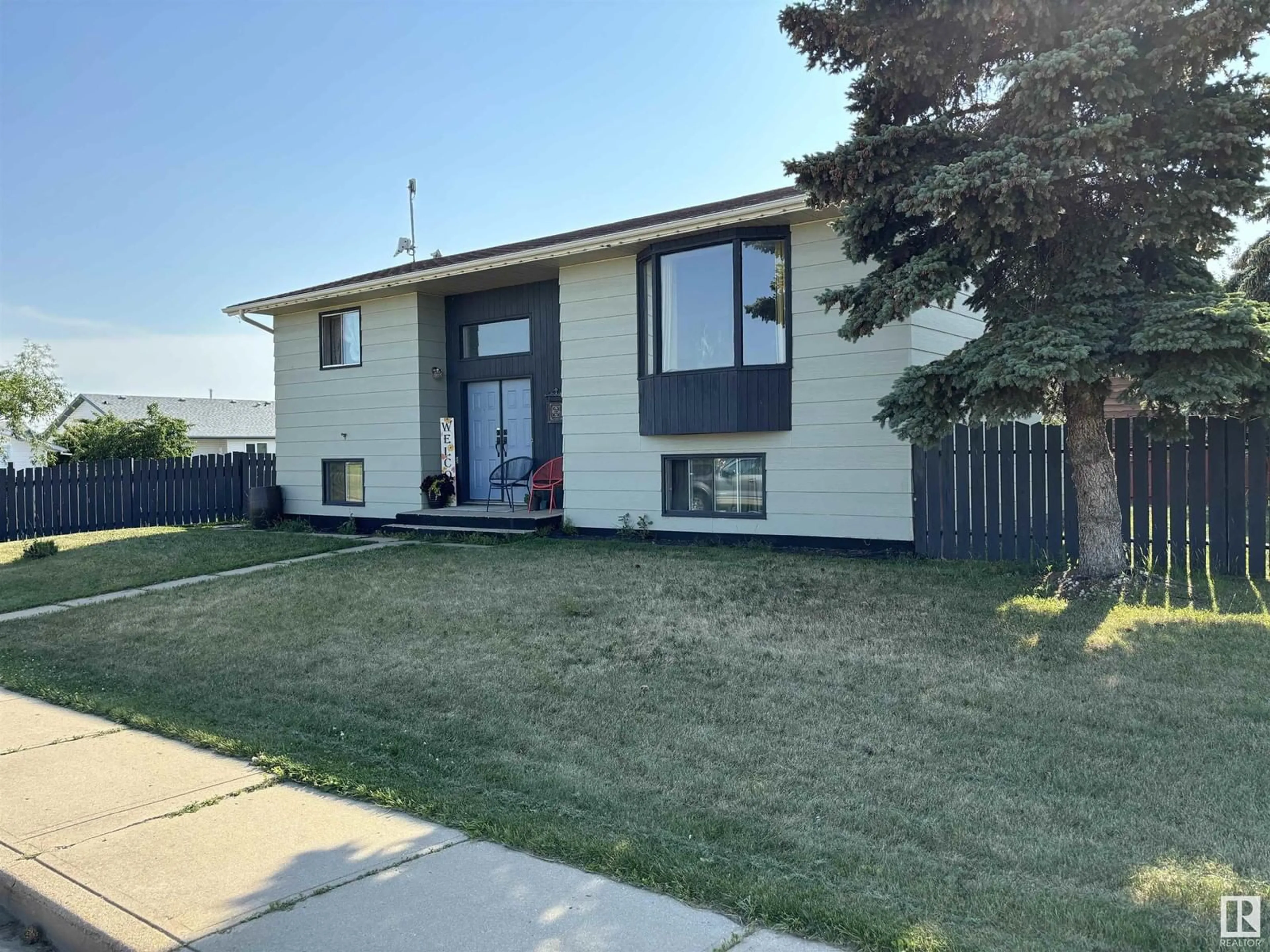 Frontside or backside of a home for 5210 43 ST, Tofield Alberta T0B4J0