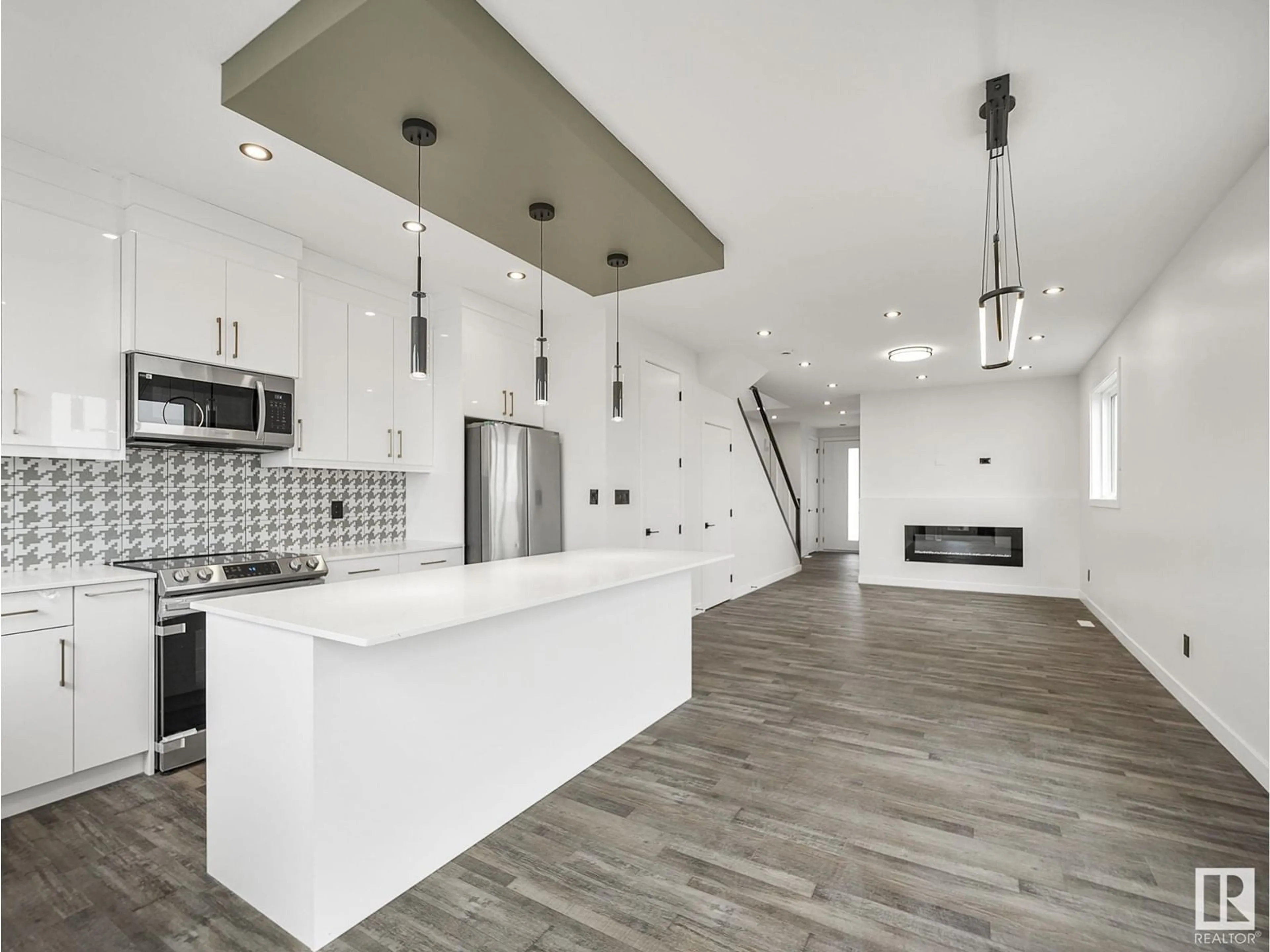 Open concept kitchen for 12475 47 ST NW NW, Edmonton Alberta T5W5E5