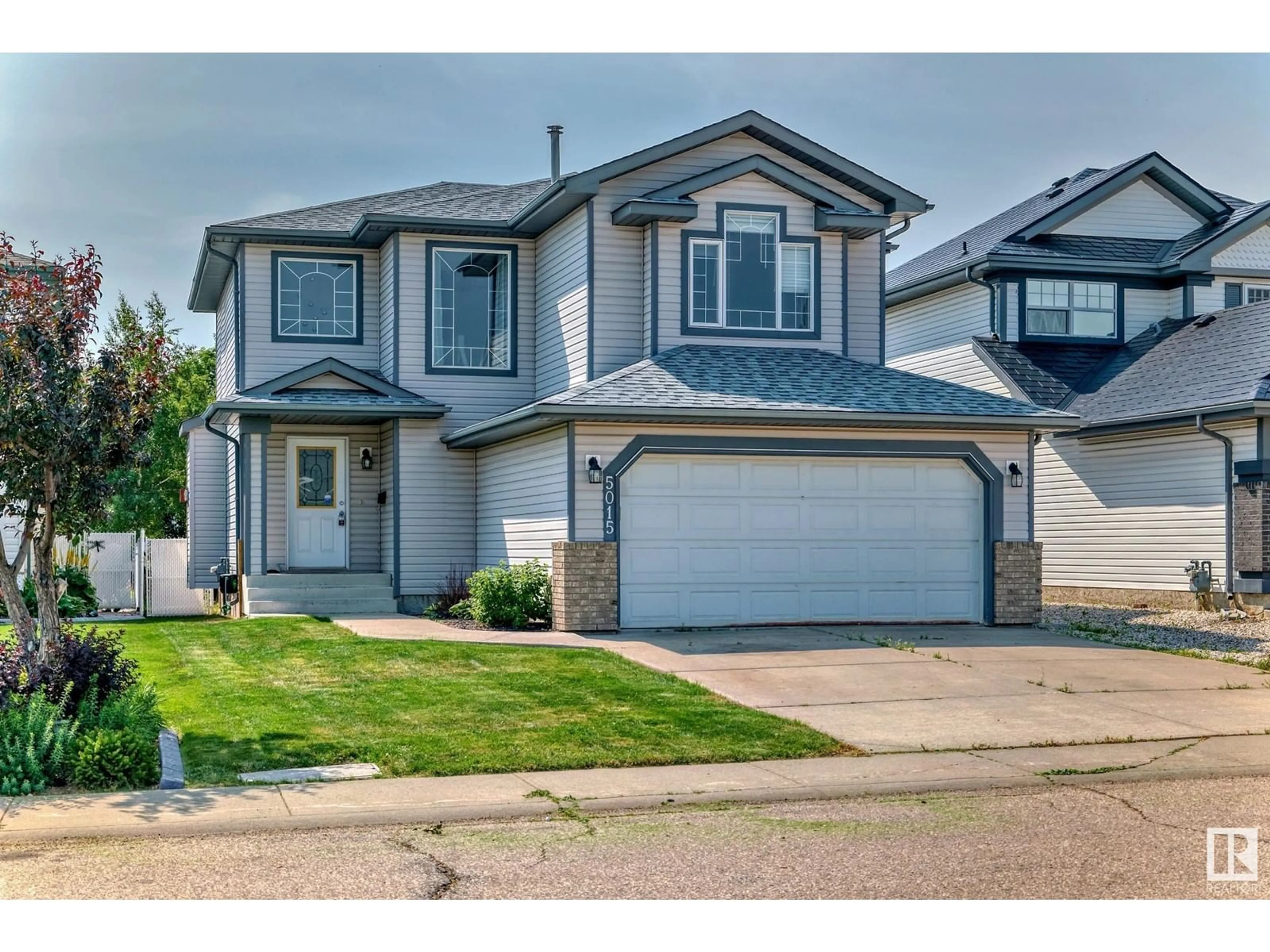 Frontside or backside of a home for 5015 152 A AV NW, Edmonton Alberta T5A5E7