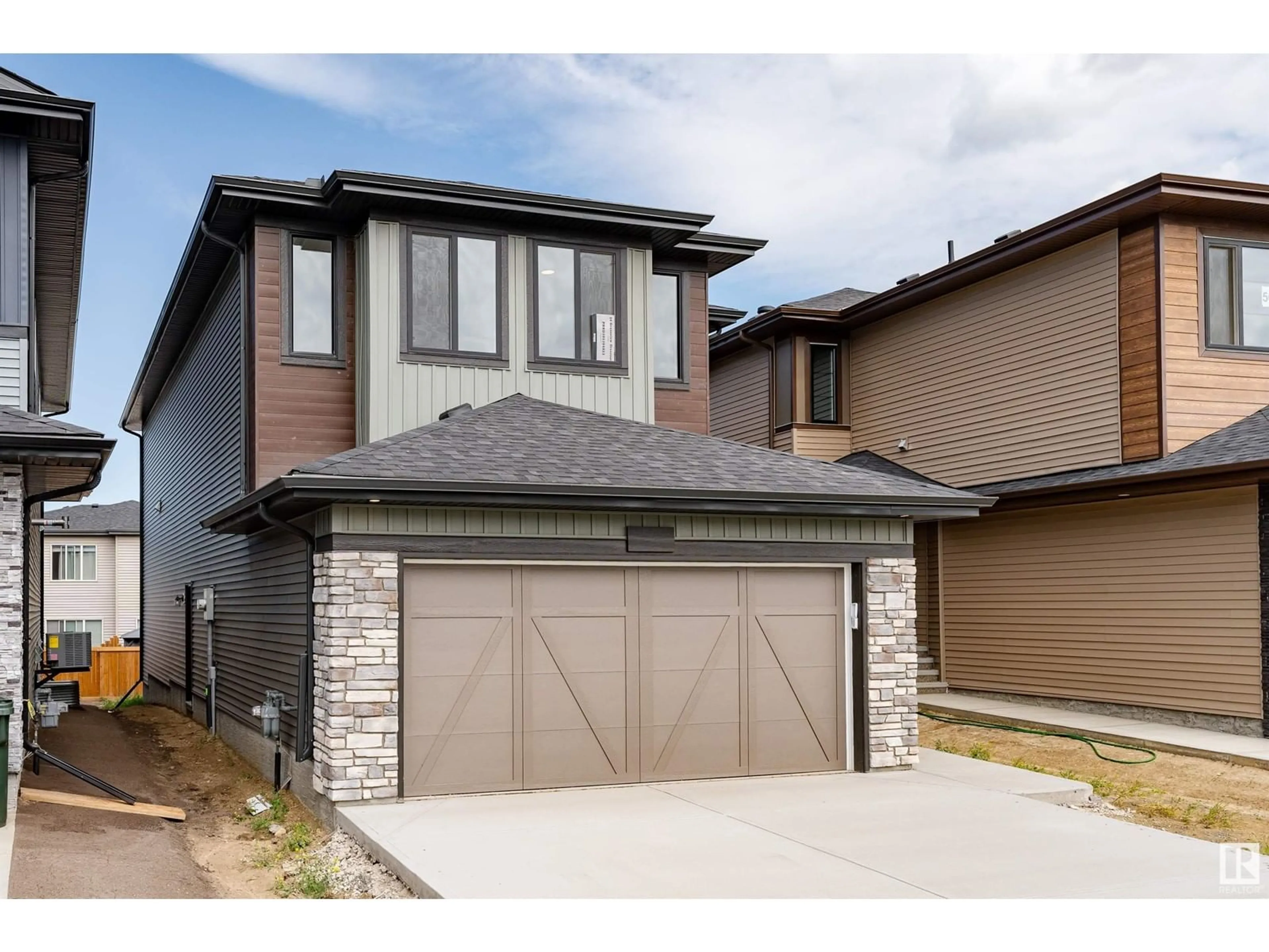 Frontside or backside of a home for 54 GRASSVIEW CR, Spruce Grove Alberta T7X3G1