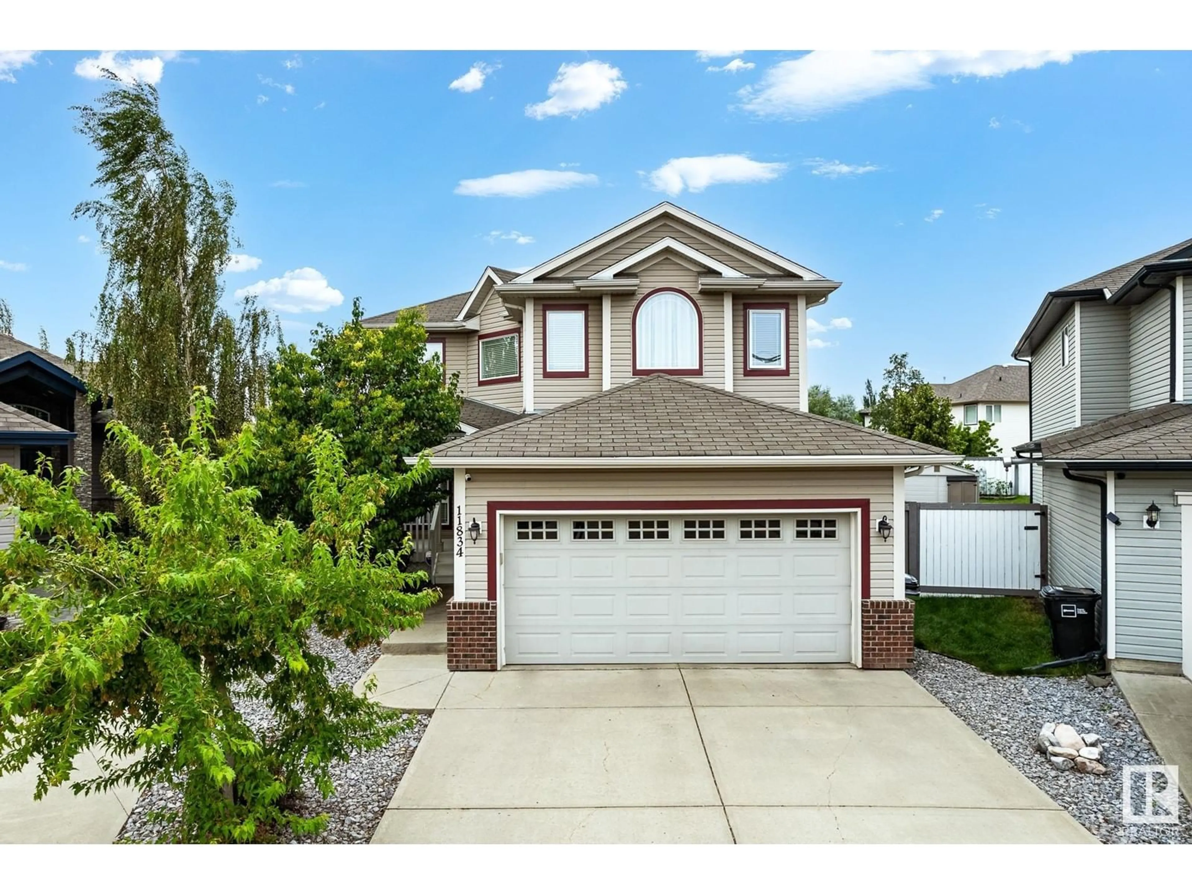 Frontside or backside of a home for 11834 13a AV SW, Edmonton Alberta T6W0E7