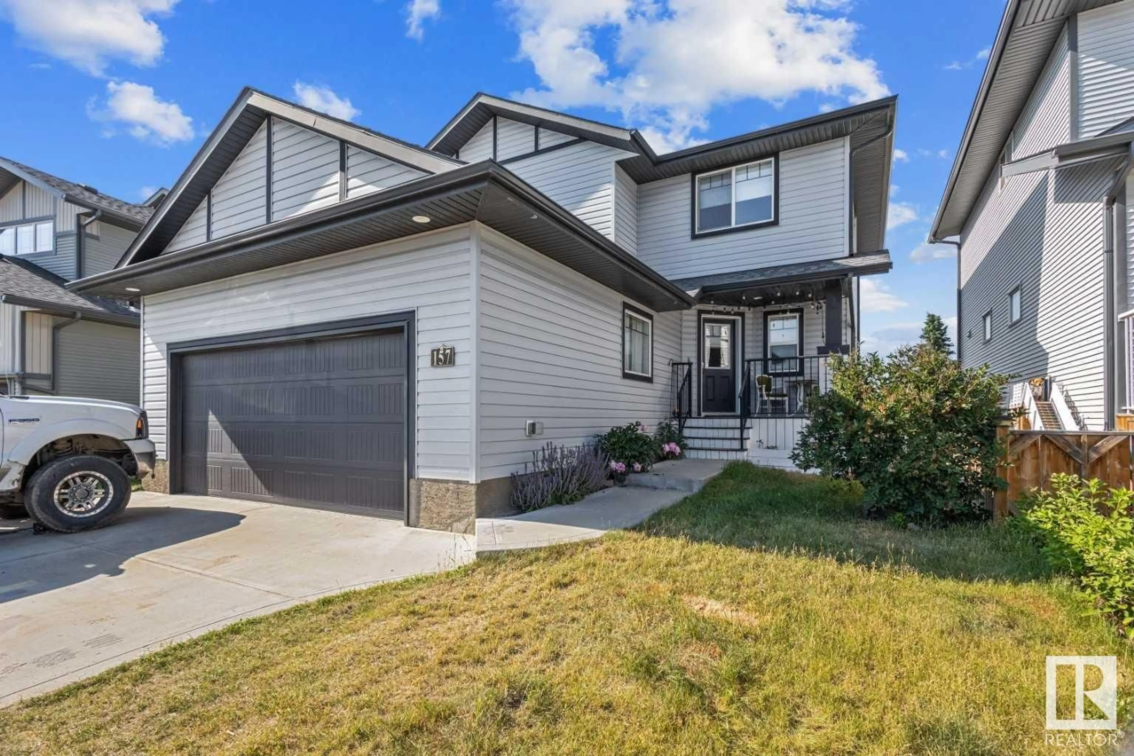 Frontside or backside of a home for 157 Bowman CI, Sylvan Lake Alberta T4S0H8