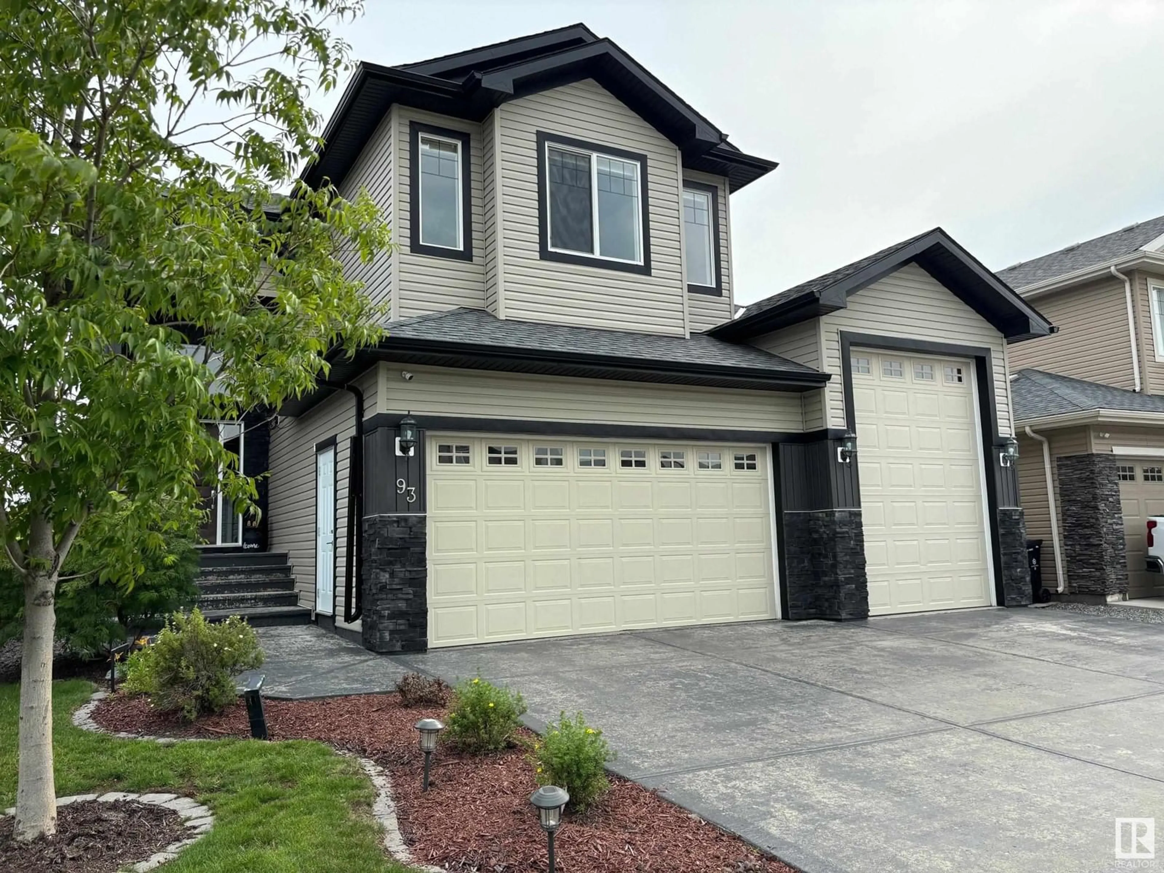 Frontside or backside of a home for 93 CARAGANA WY, Fort Saskatchewan Alberta T8L0P4