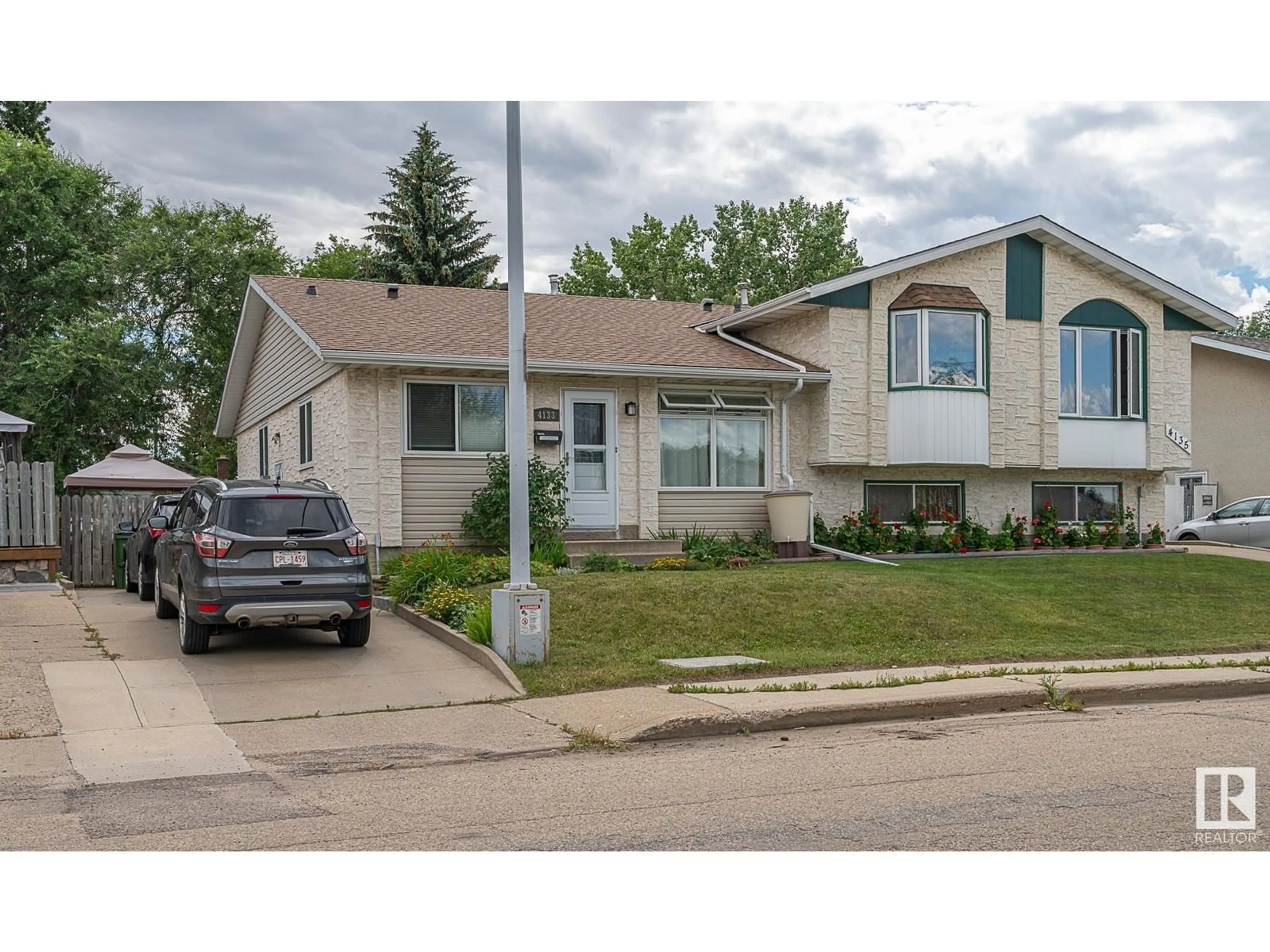 Frontside or backside of a home for 4133 134 AV NW, Edmonton Alberta T5A2T3