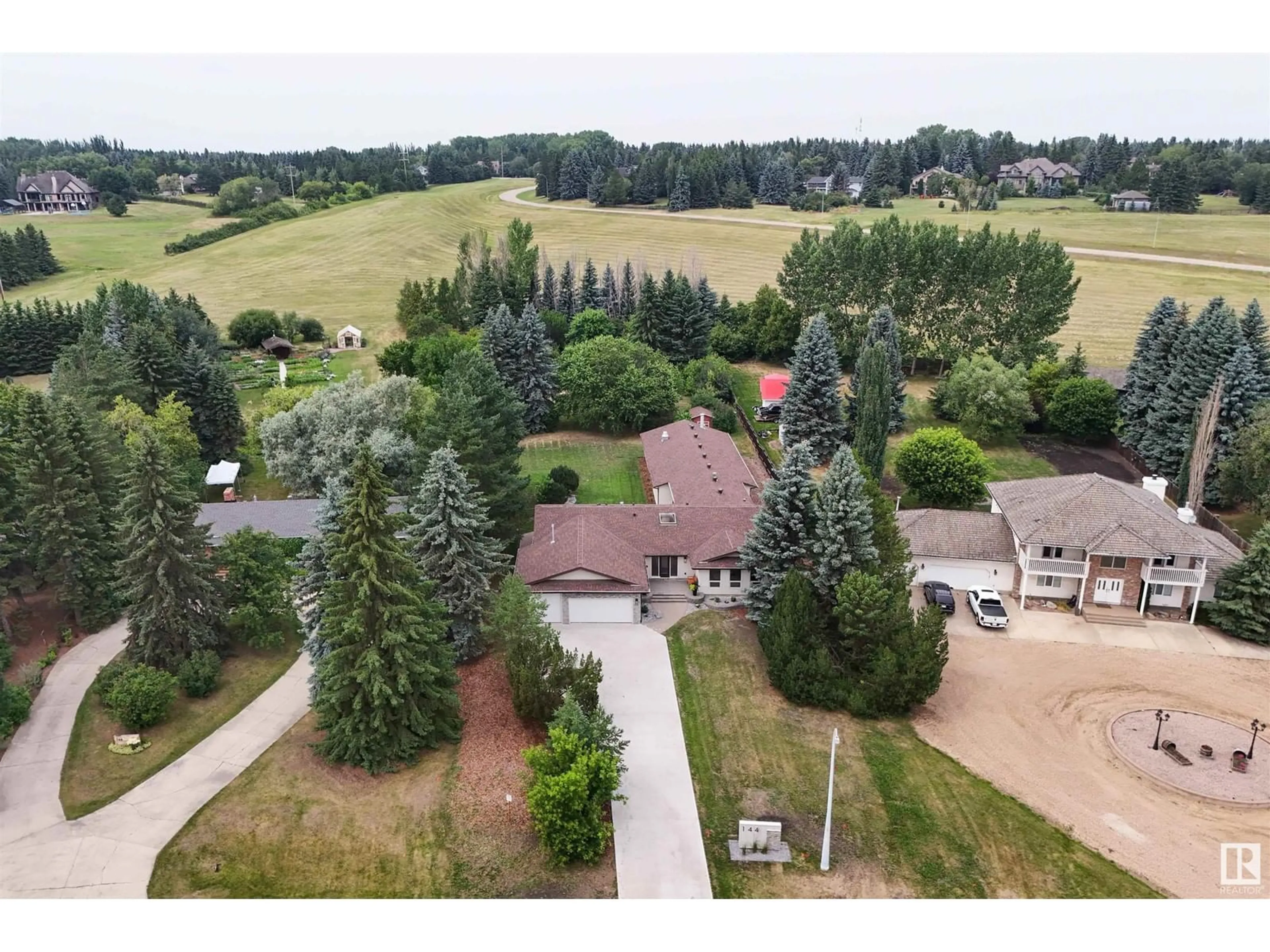 Frontside or backside of a home for #144 Fernwood CR, Rural Sturgeon County Alberta T8T0C7