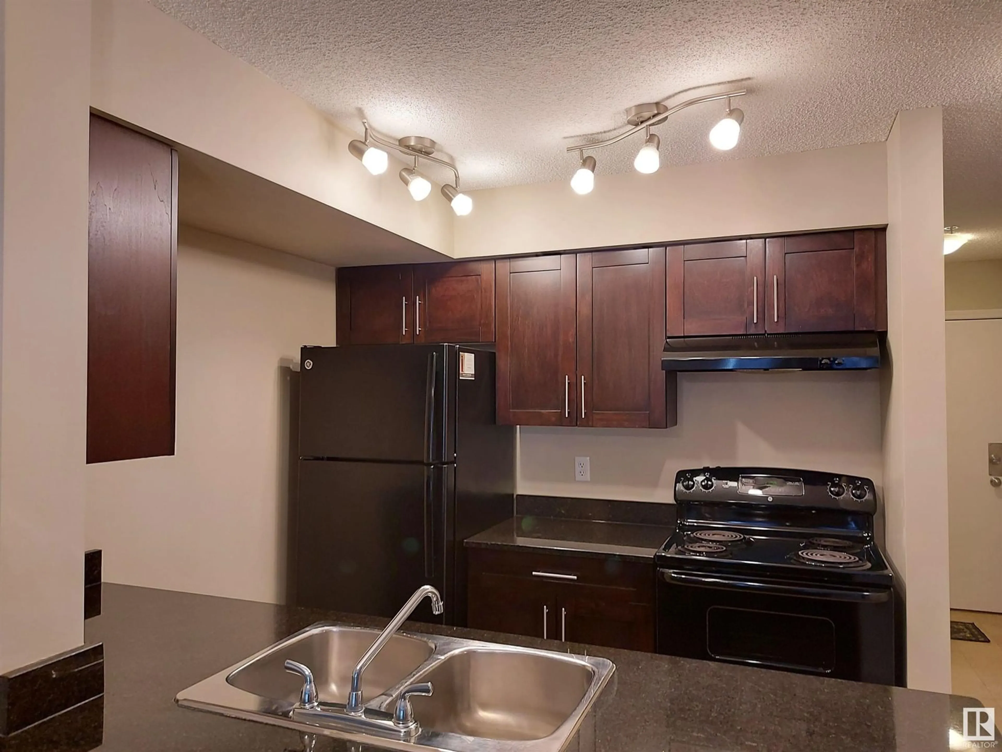 Standard kitchen for #103 12035 22 AV SW, Edmonton Alberta T6W2X9