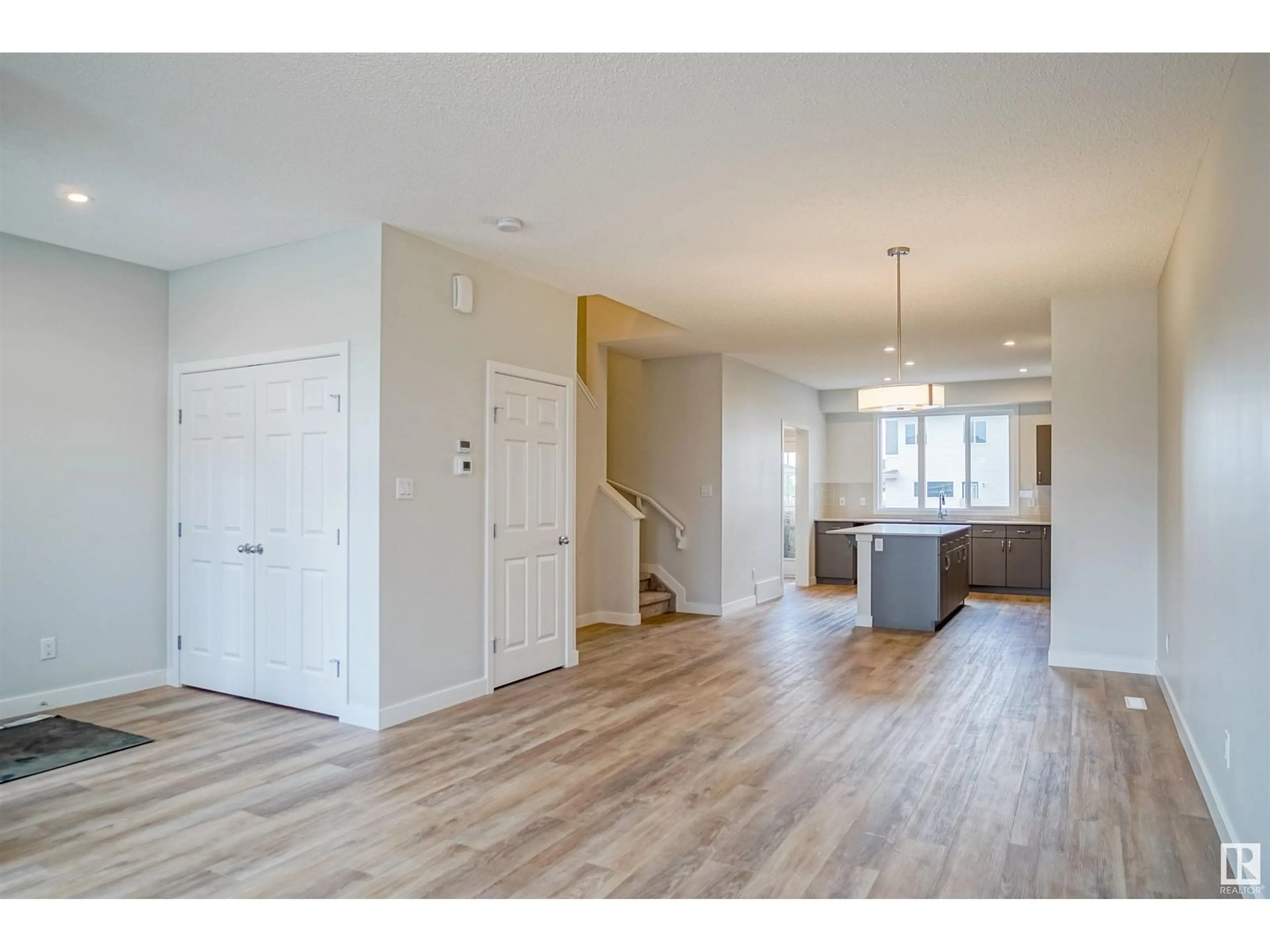 Indoor entryway, wood floors for 17647 49 ST NW, Edmonton Alberta T5Y4B7