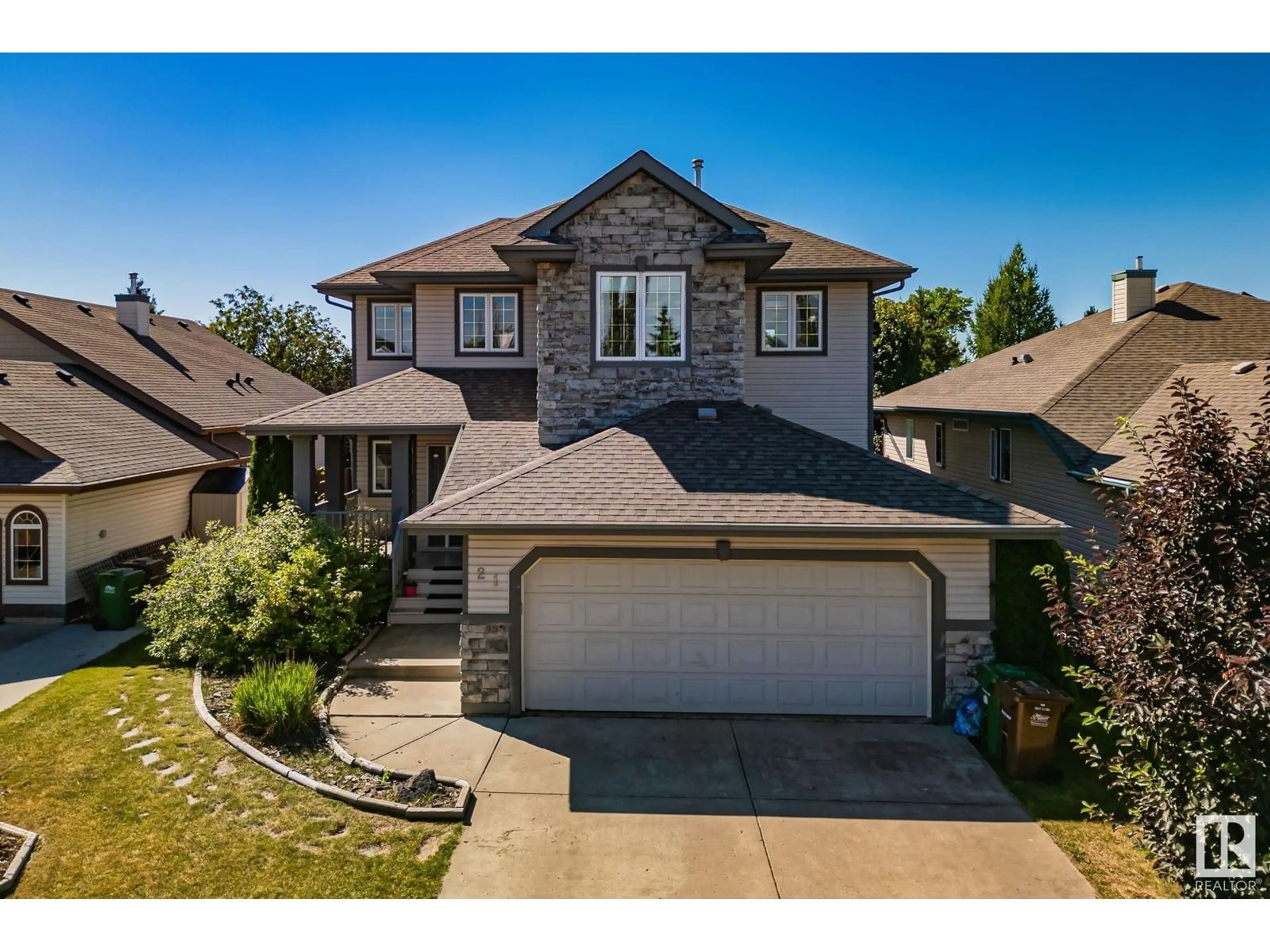 Frontside or backside of a home for 21 DELWOOD PL, St. Albert Alberta T8N6Y5