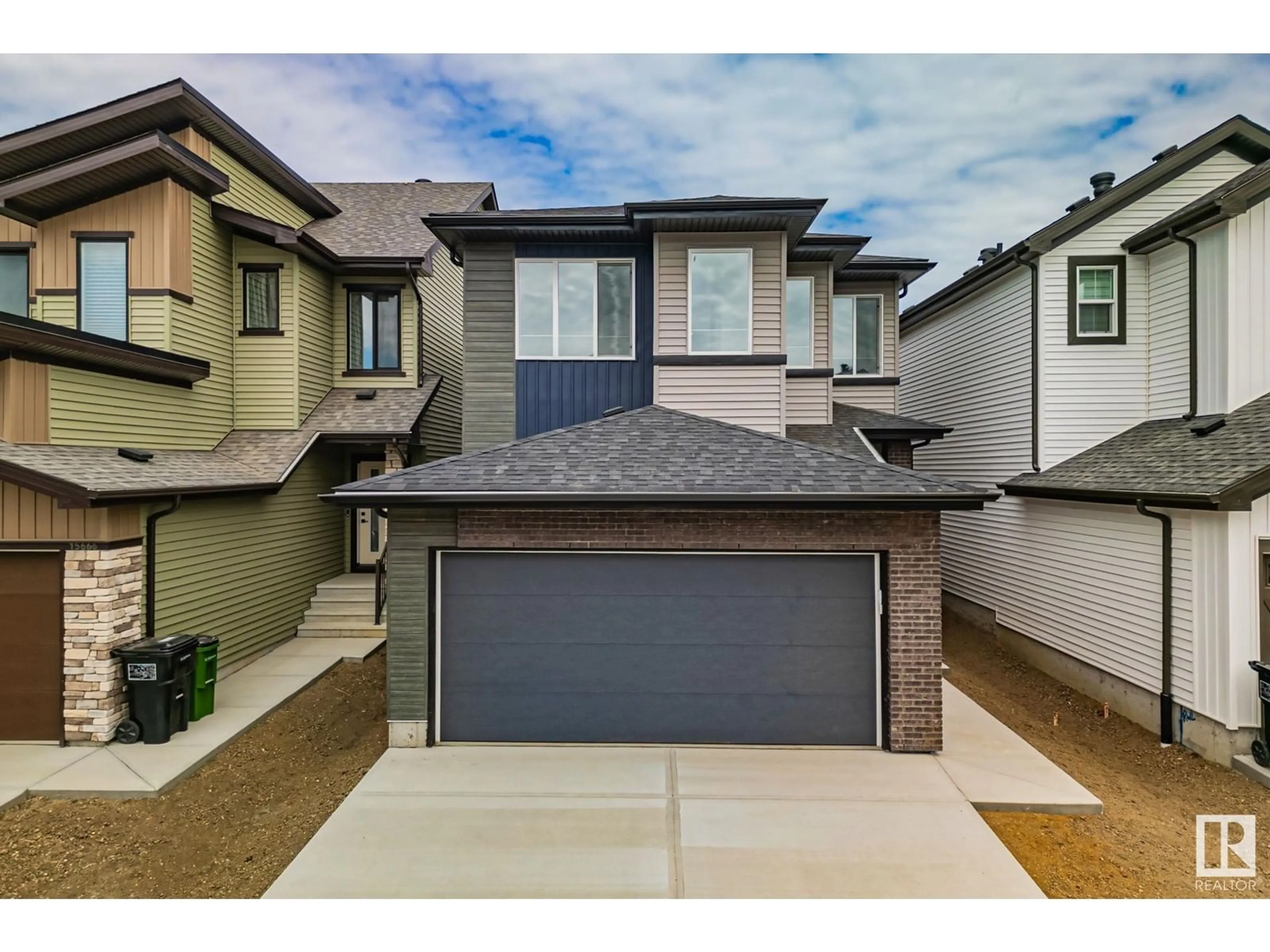 Frontside or backside of a home for 15664 18 AV SW, Edmonton Alberta T6W5C2