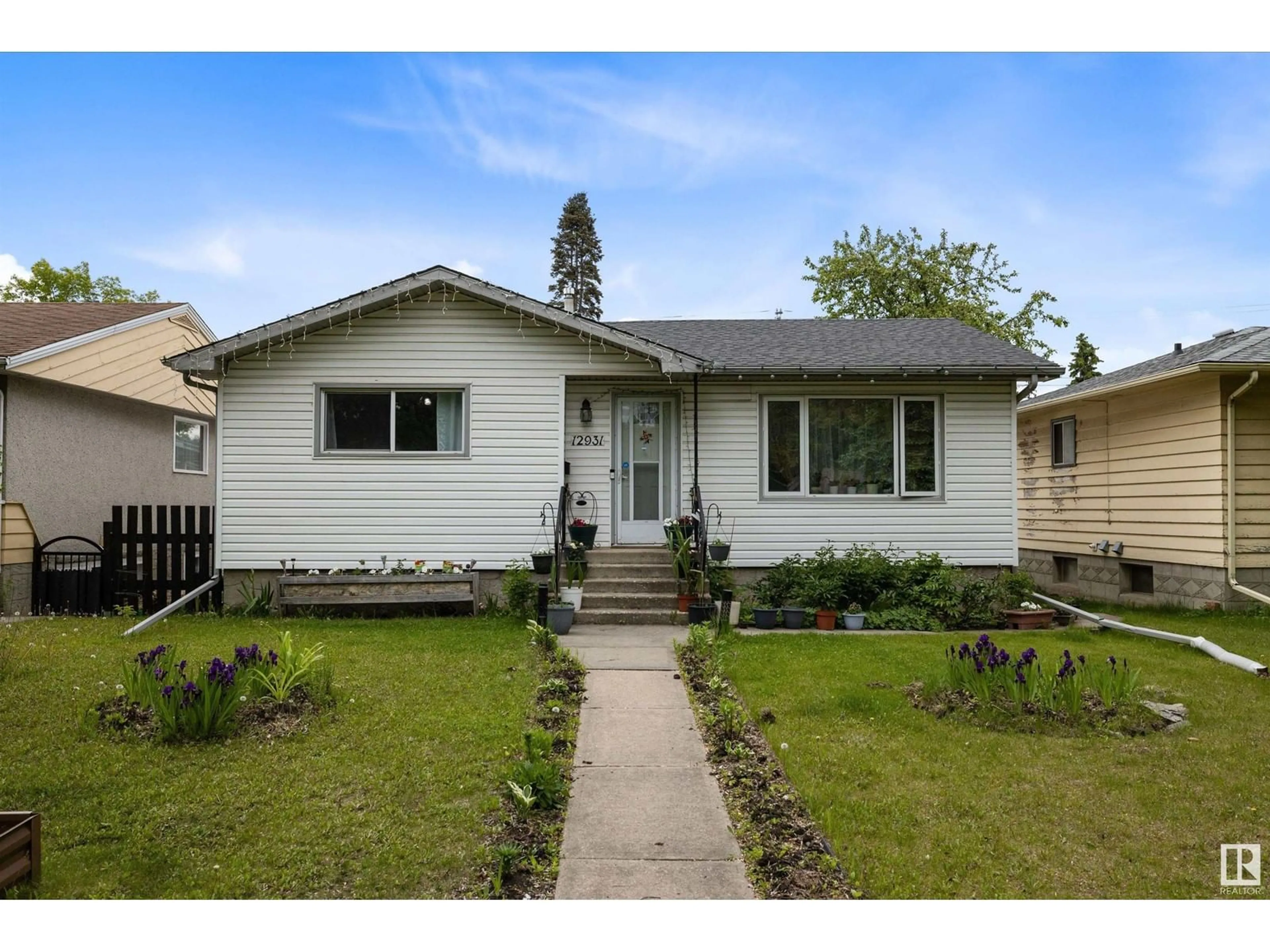 Frontside or backside of a home for 12931 113A ST NW, Edmonton Alberta T5E5B4