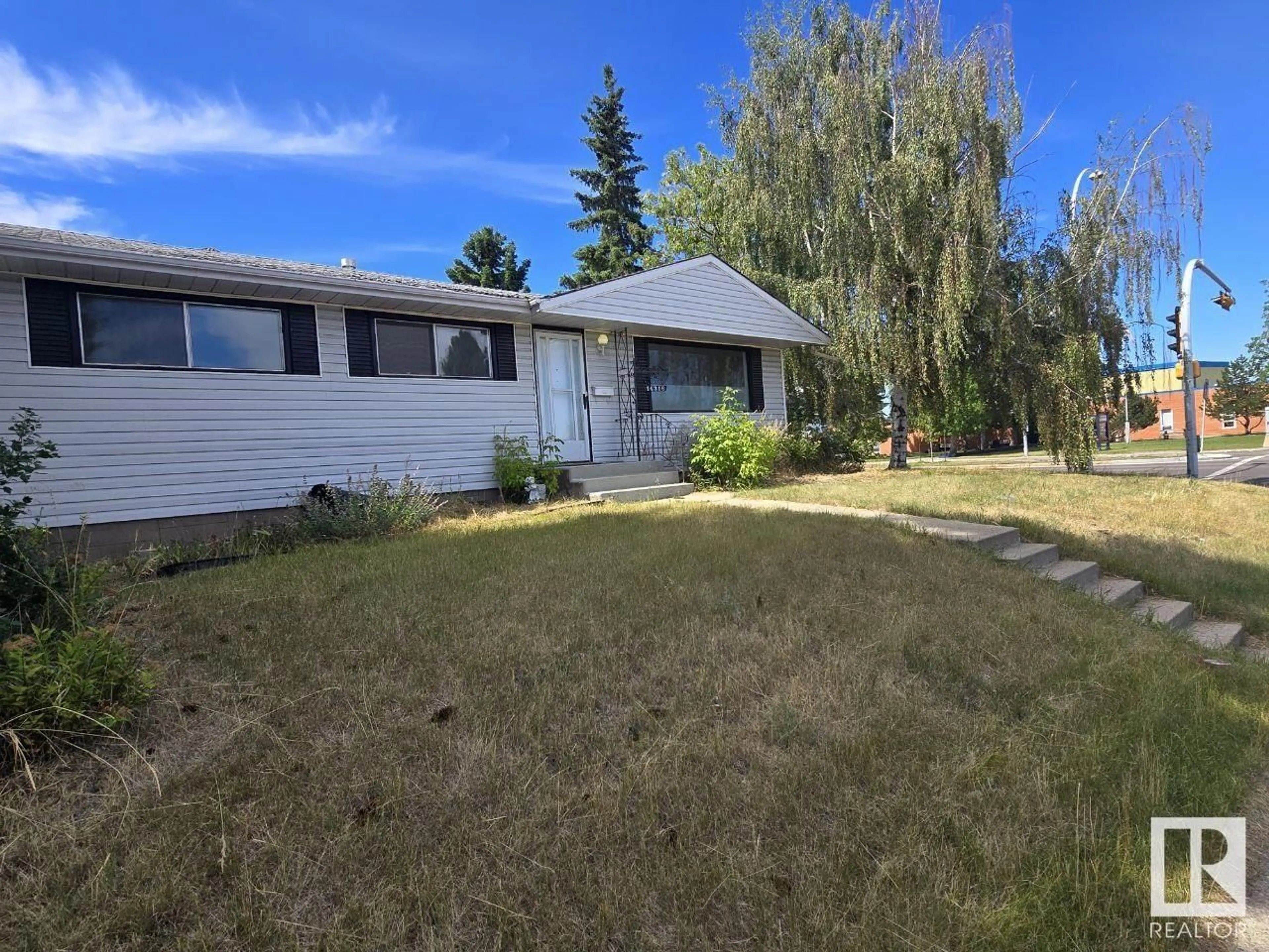 Frontside or backside of a home for 14316 71 ST NW, Edmonton Alberta T5C0N4