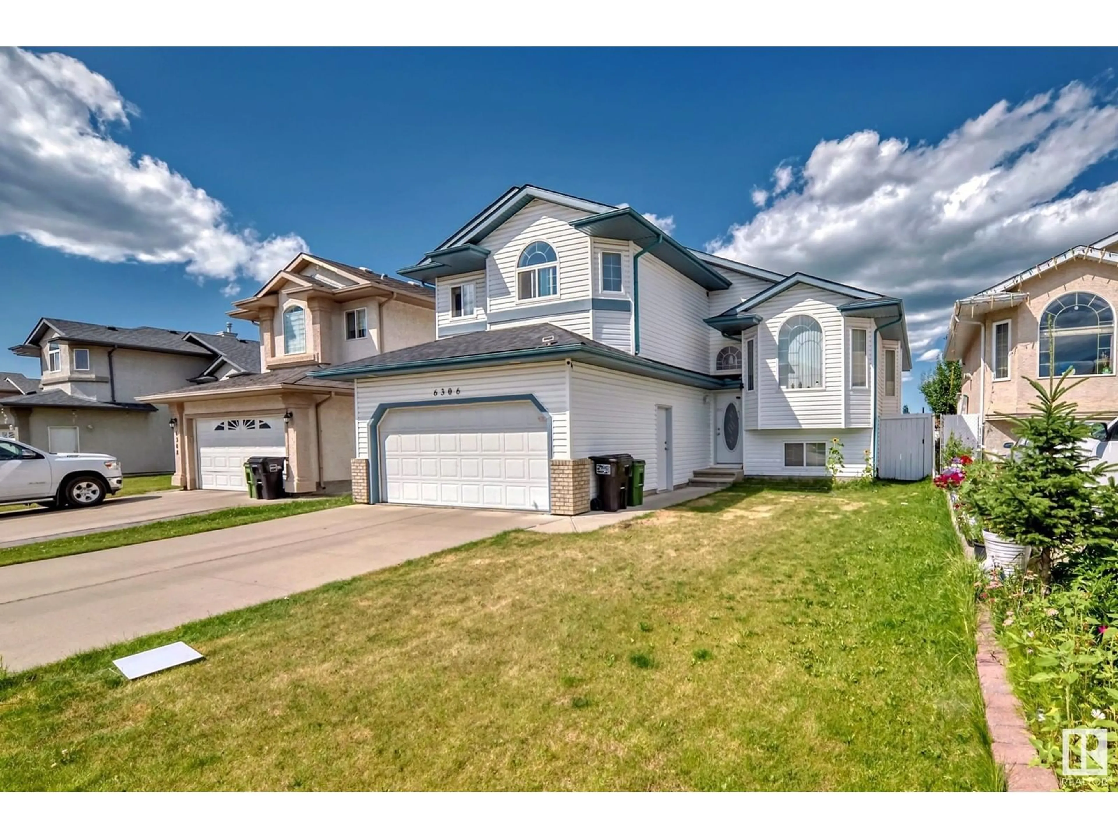 Frontside or backside of a home for 6306 164 AV NW, Edmonton Alberta T5Y3K4